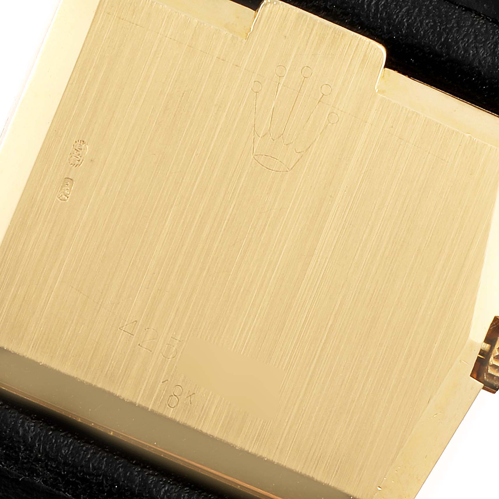 This image shows the back case of a Rolex Cellini 4017 Men's Yellow Gold Champagne Dial 4017 Men's Yellow Gold Champagne Dial watch, made of 18K gold.