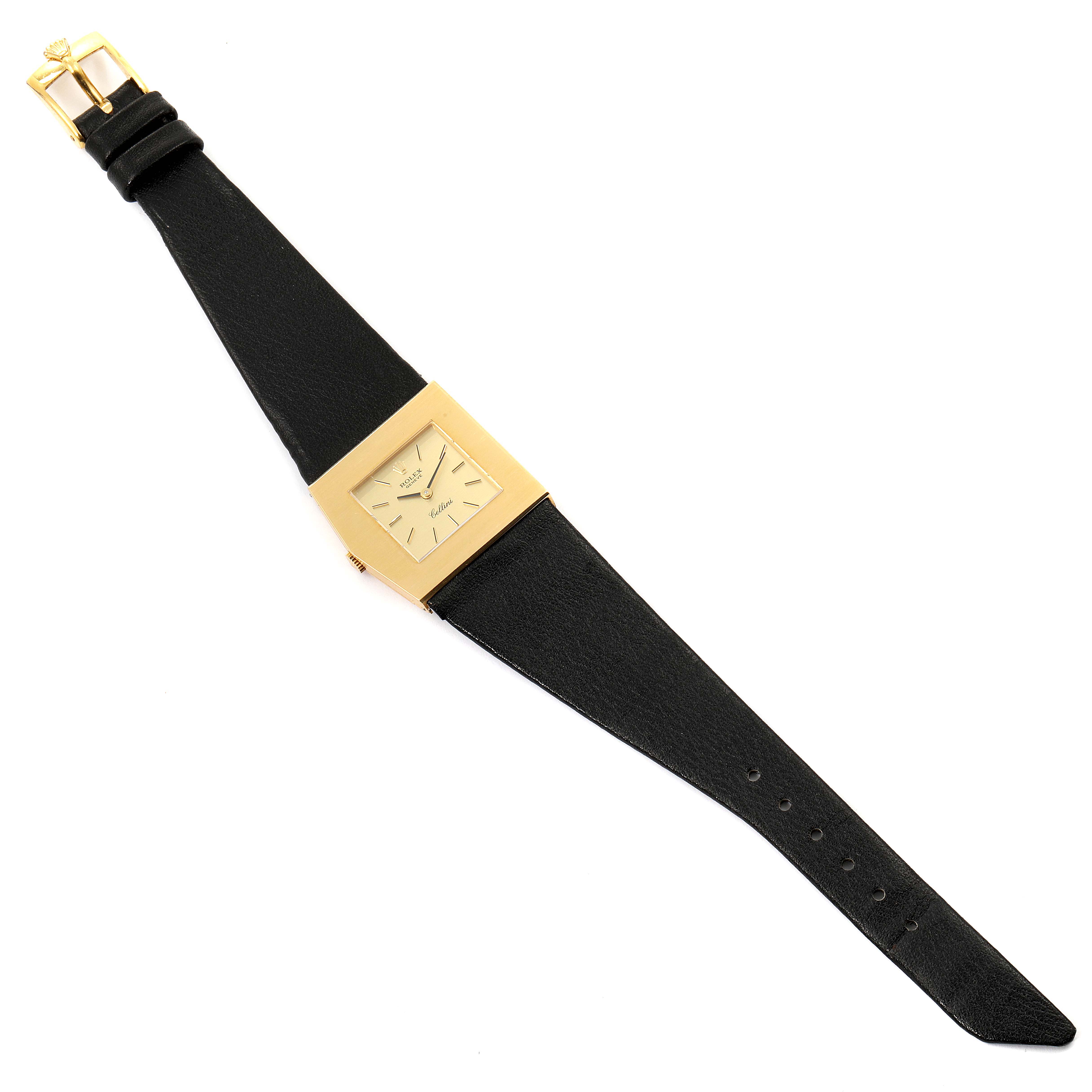 The image depicts a Rolex Cellini 4017 Men's Yellow Gold Champagne Dial 4017 Men's Yellow Gold Champagne Dial watch, showcasing a top-down angle of its square gold case and black leather strap.