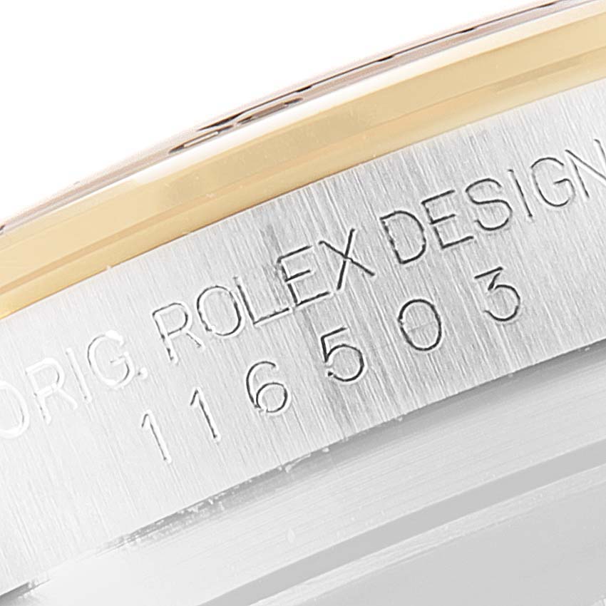 This image shows the side engraving with the model number of a Rolex Daytona 116503 Men
s Steel and Gold (two tone) White Dial 116503 Men
s Steel and Gold (two tone) White Dial watch.