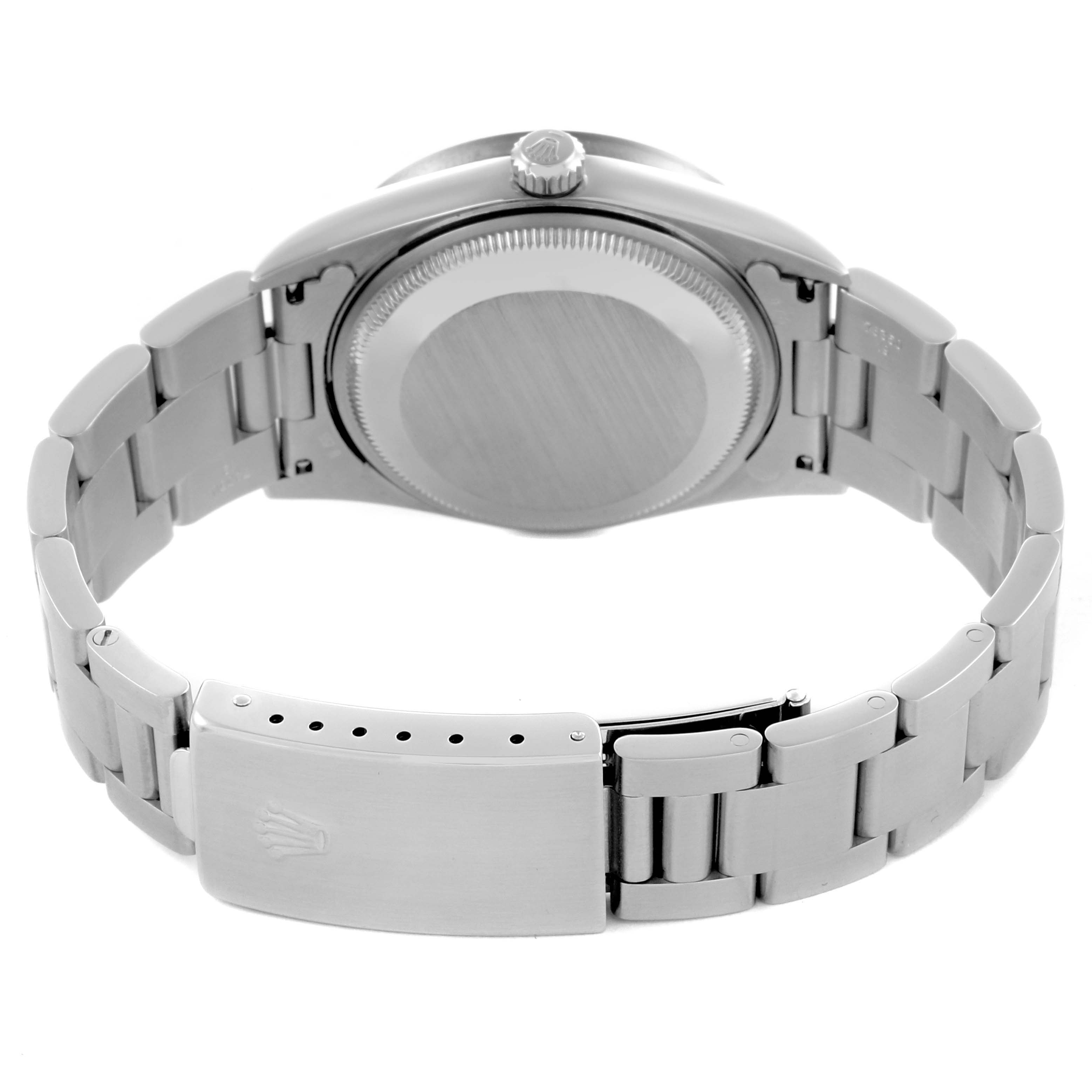 The image shows the back and clasp of a Rolex Date 15210 Men's Stainless Steel Blue Dial 15210 Men's Stainless Steel Blue Dial model watch at an angle highlighting the bracelet and case back.