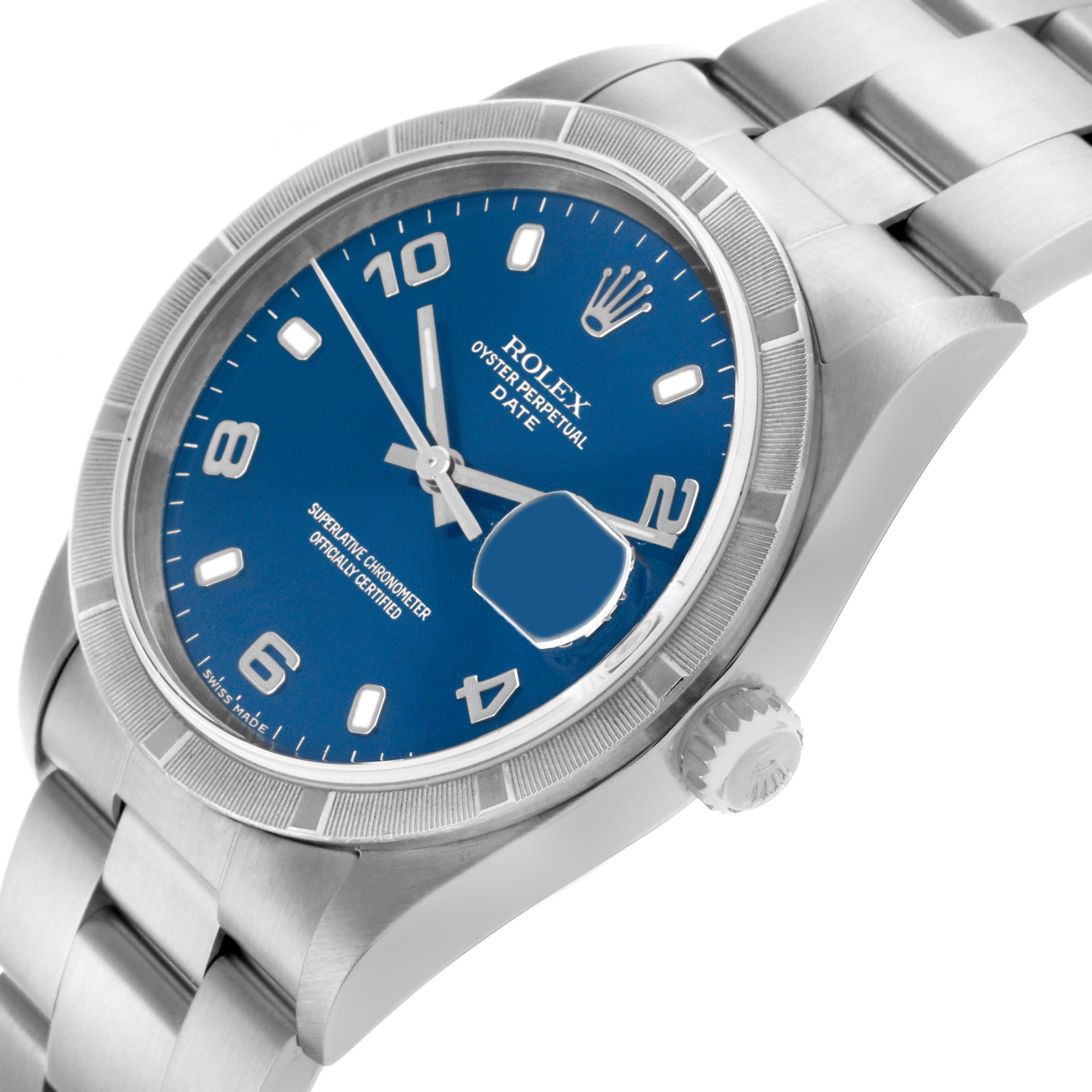 The Rolex Date 15210 Men's Stainless Steel Blue Dial 15210 Men's Stainless Steel Blue Dial watch is shown at an angled close-up, displaying the face, bezel, crown, and part of the bracelet.