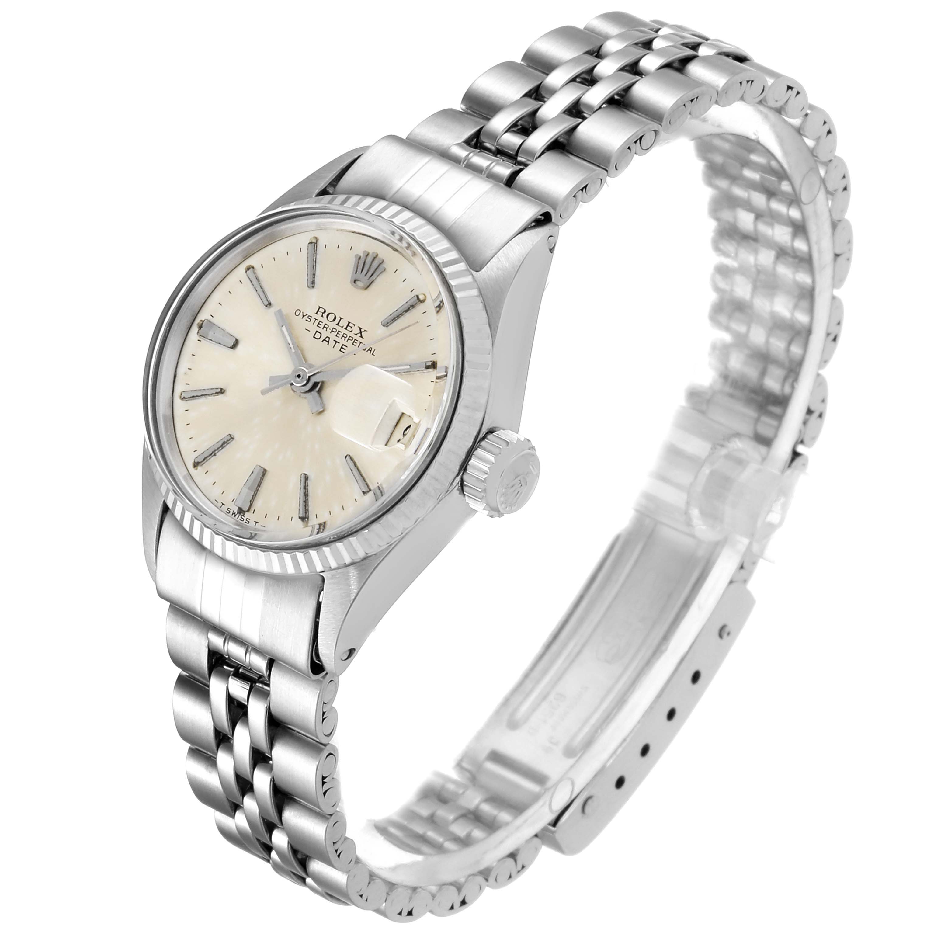 The Rolex Date 6517 Women's Stainless Steel Silver Dial 6517 Women's Stainless Steel Silver Dial watch is shown at an angle displaying the face, crown, and bracelet clearly.