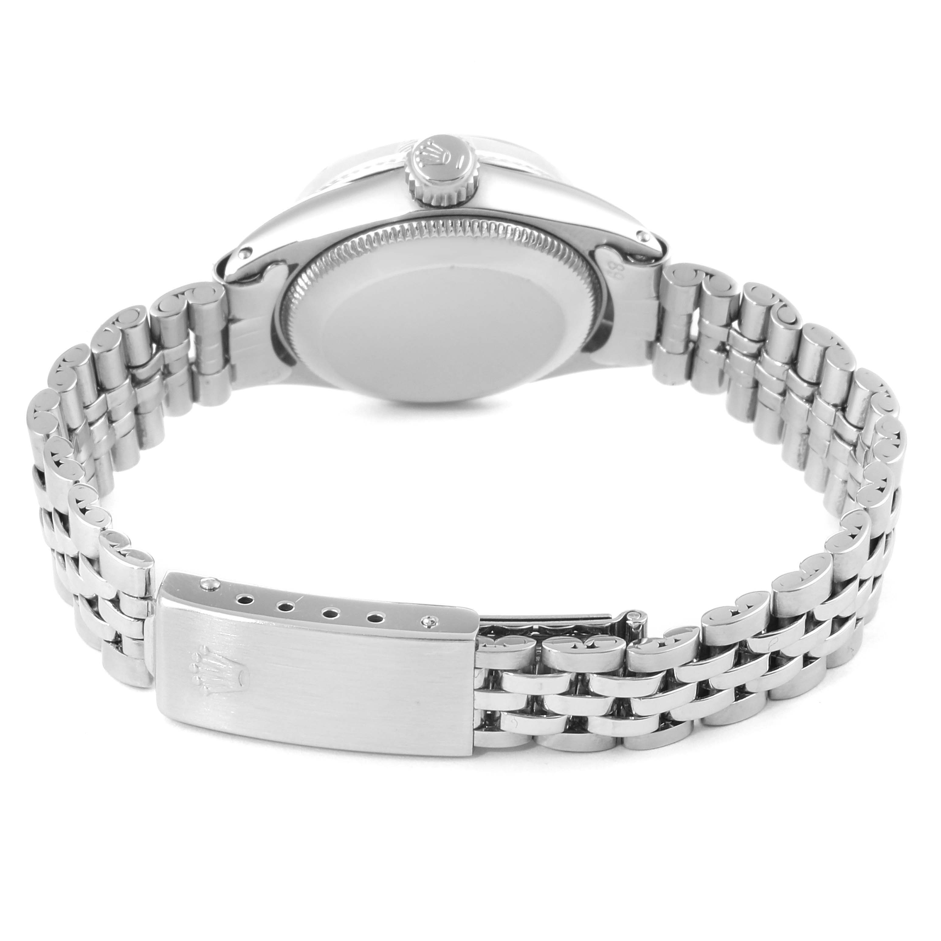 The image shows the back view of a Rolex Date 6517 Women's Stainless Steel Silver Dial 6517 Women's Stainless Steel Silver Dial model watch, highlighting the clasp, case back, and bracelet.