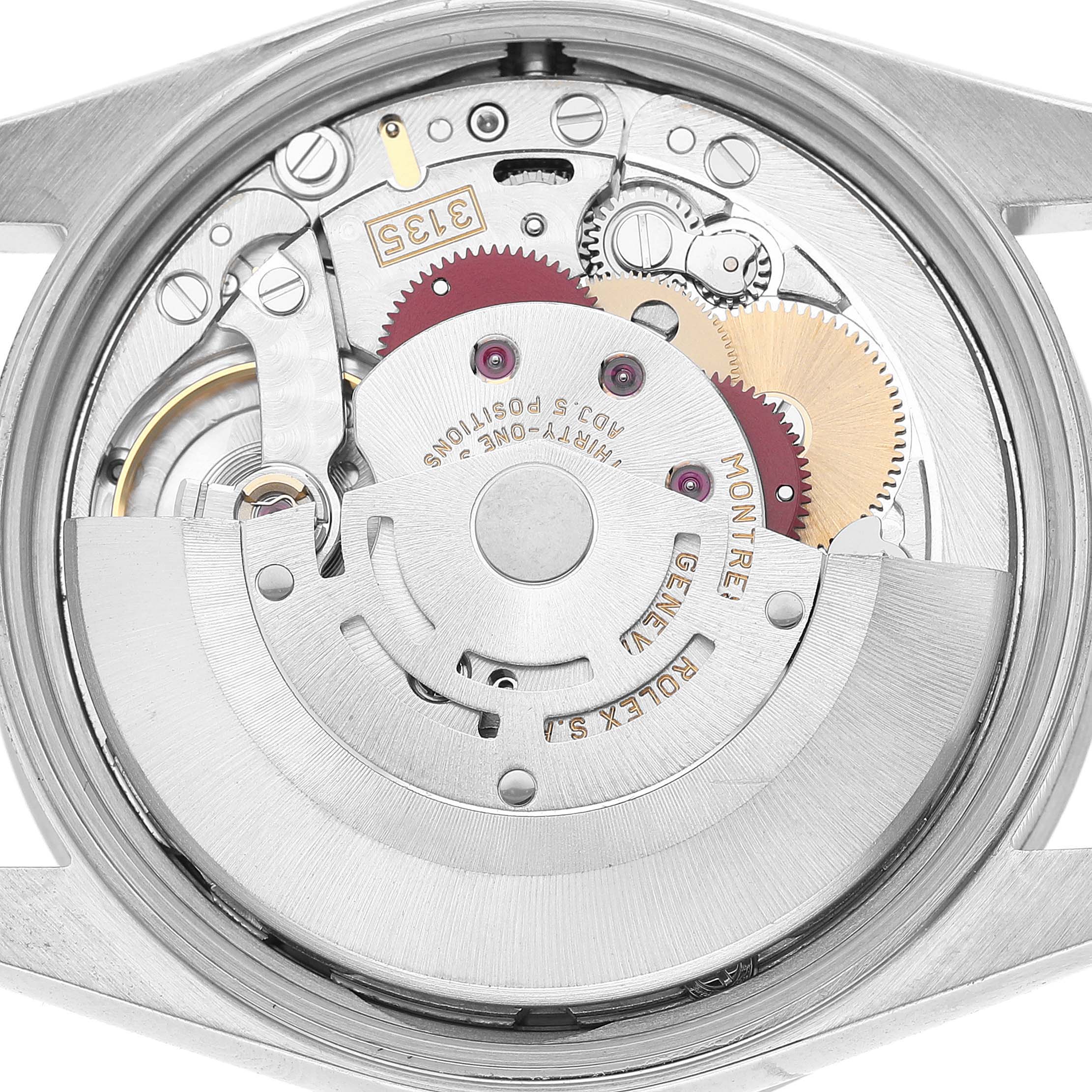 The image shows the internal movement mechanism of the Rolex Date 15210 Men's Stainless Steel Silver Dial model, viewed from the back case.