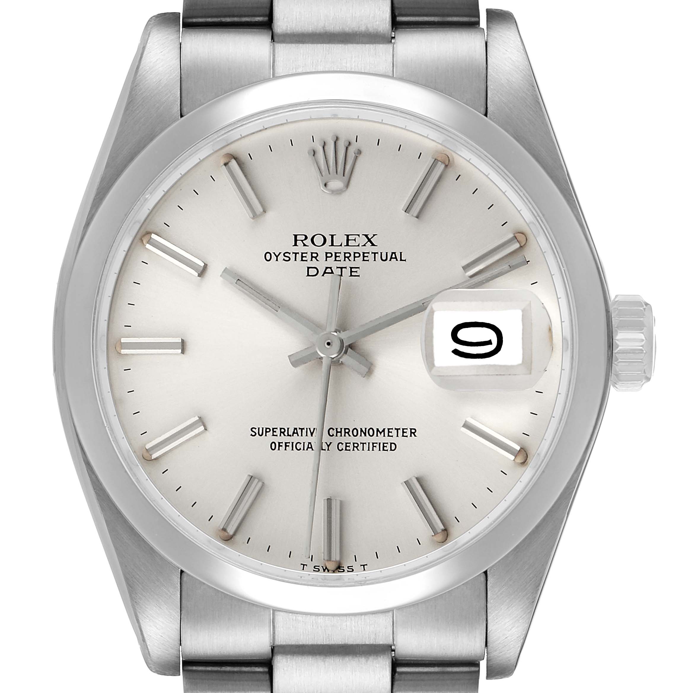 The Rolex Date 1500 Men's Stainless Steel Silver Dial watch is shown from a top-down angle, highlighting the dial, hands, crown, and part of the bracelet.