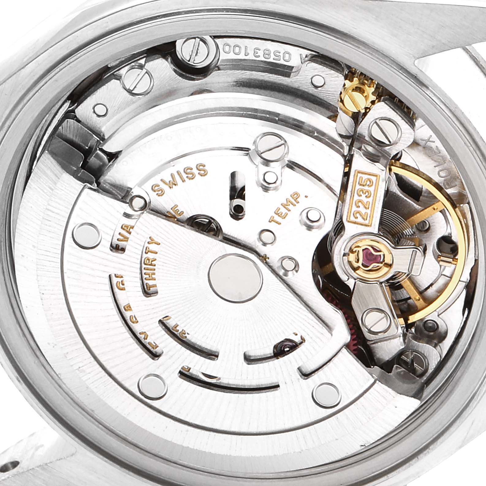 The image shows a close-up view of the movement mechanism of a Rolex Datejust 79174 Women's Stainless Steel Pink Dial 79174 Women's Stainless Steel Pink Dial watch.