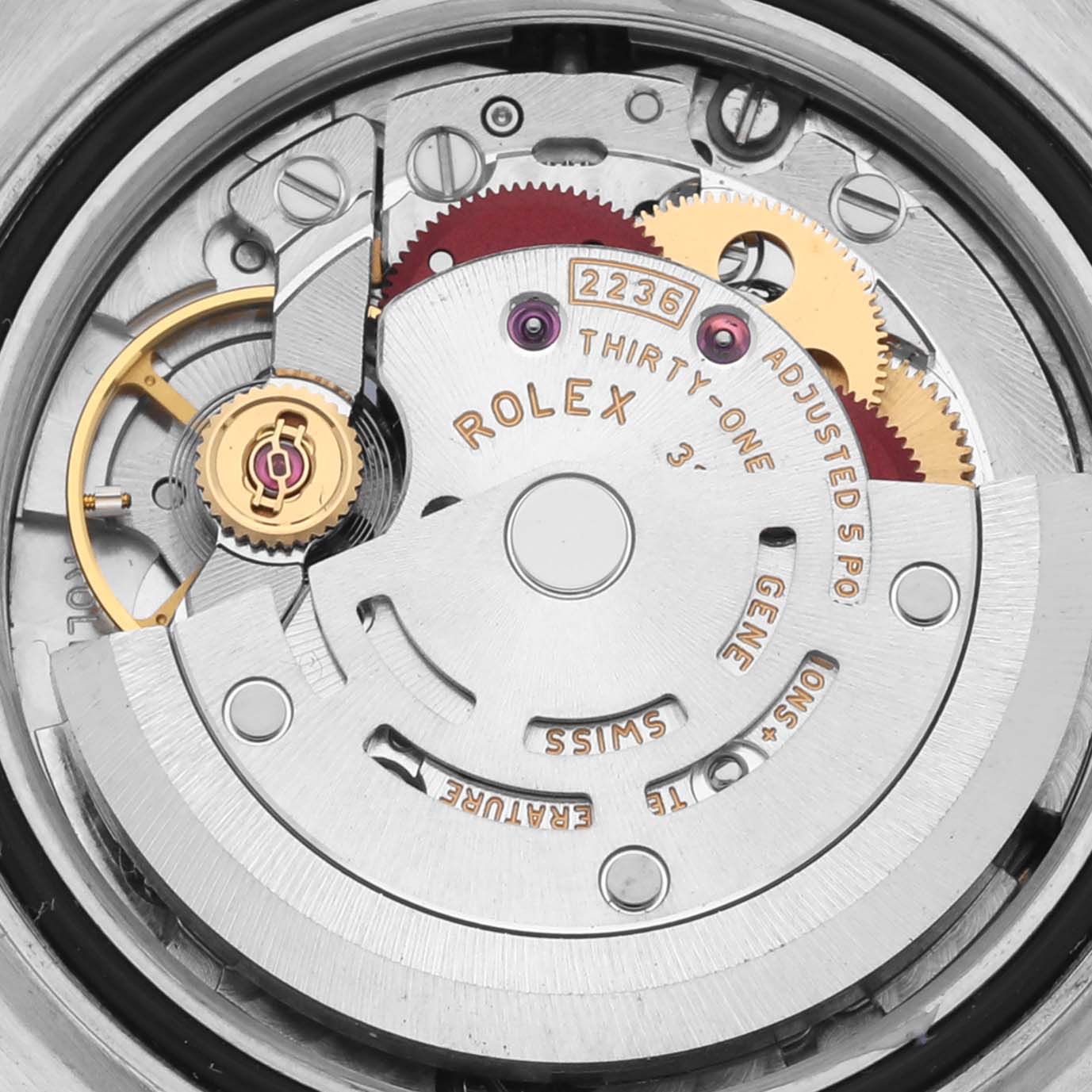 The image shows a top-down view of the movement inside a Rolex Datejust 279383 Women's Steel and Gold (two tone) Purple Dial 279383 Women's Steel and Gold (two tone) Purple Dial, highlighting gears and inscriptions.