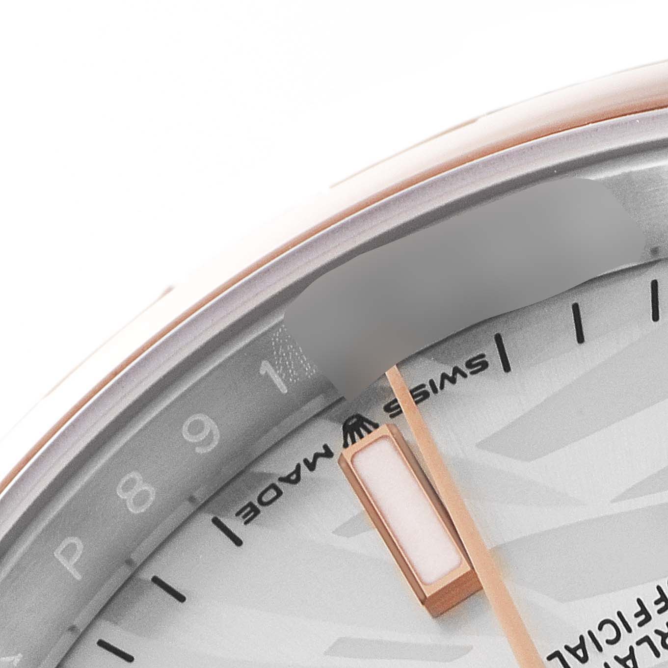 The image shows a close-up angle of the dial and minute markers on a Rolex Datejust 126201 Men's Steel and Gold (two tone) Silver Dial 126201 Men's Steel and Gold (two tone) Silver Dial watch.