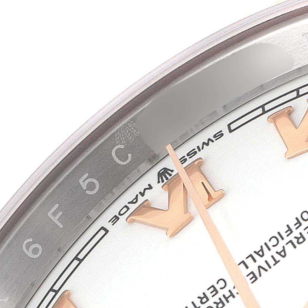 This image shows a close-up angle of the dial with Roman numerals and part of the rehaut of the Rolex Datejust 126231 Men's Steel and Gold (two tone) White Dial 126231 Men's Steel and Gold (two tone) White Dial watch.
