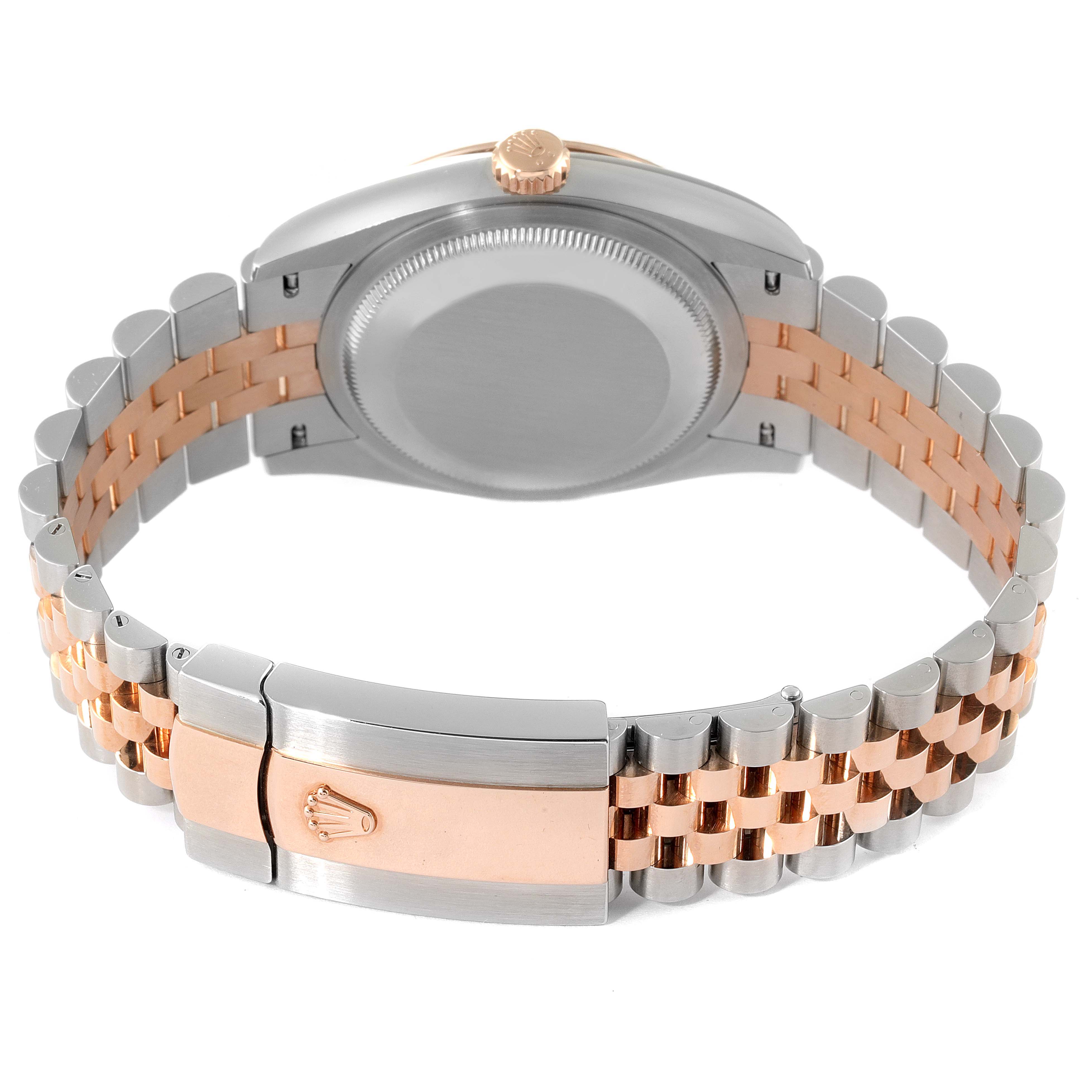 This image shows the Rolex Datejust 126231 Men's Steel and Gold (two tone) White Dial 126231 Men's Steel and Gold (two tone) White Dial watch from the back, highlighting the case back, crown, and two-tone bracelet clasp.