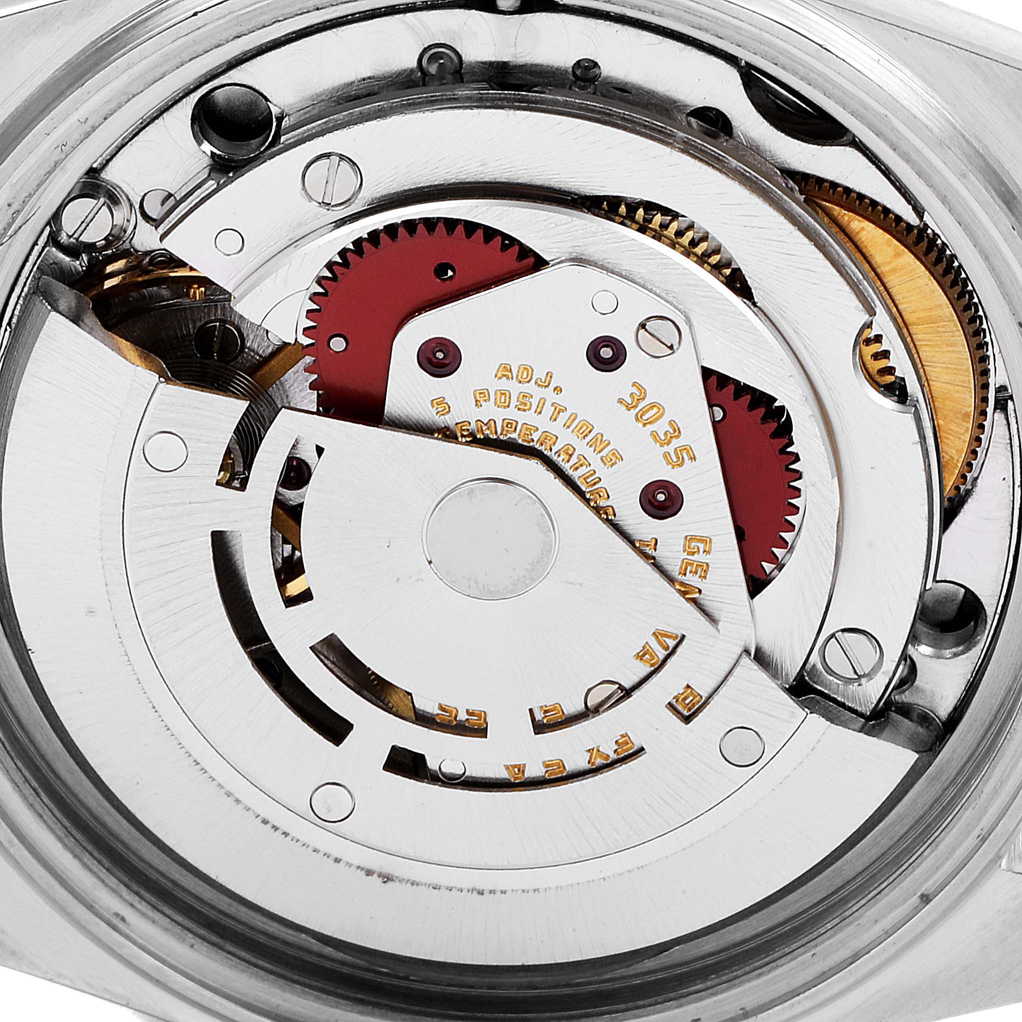 This close-up image shows the intricate movement mechanism of the Vintage Collection model by Rolex.