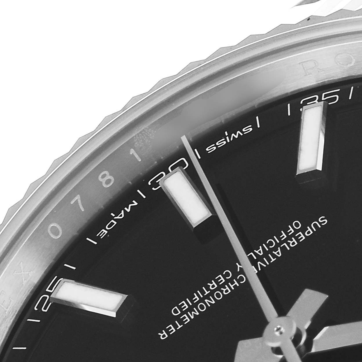 The close-up image of the Rolex Datejust 41 126334 Men's Stainless Steel Black Dial 126334 Men's Stainless Steel Black Dial model shows the dial, hour markers, and part of the bezel.