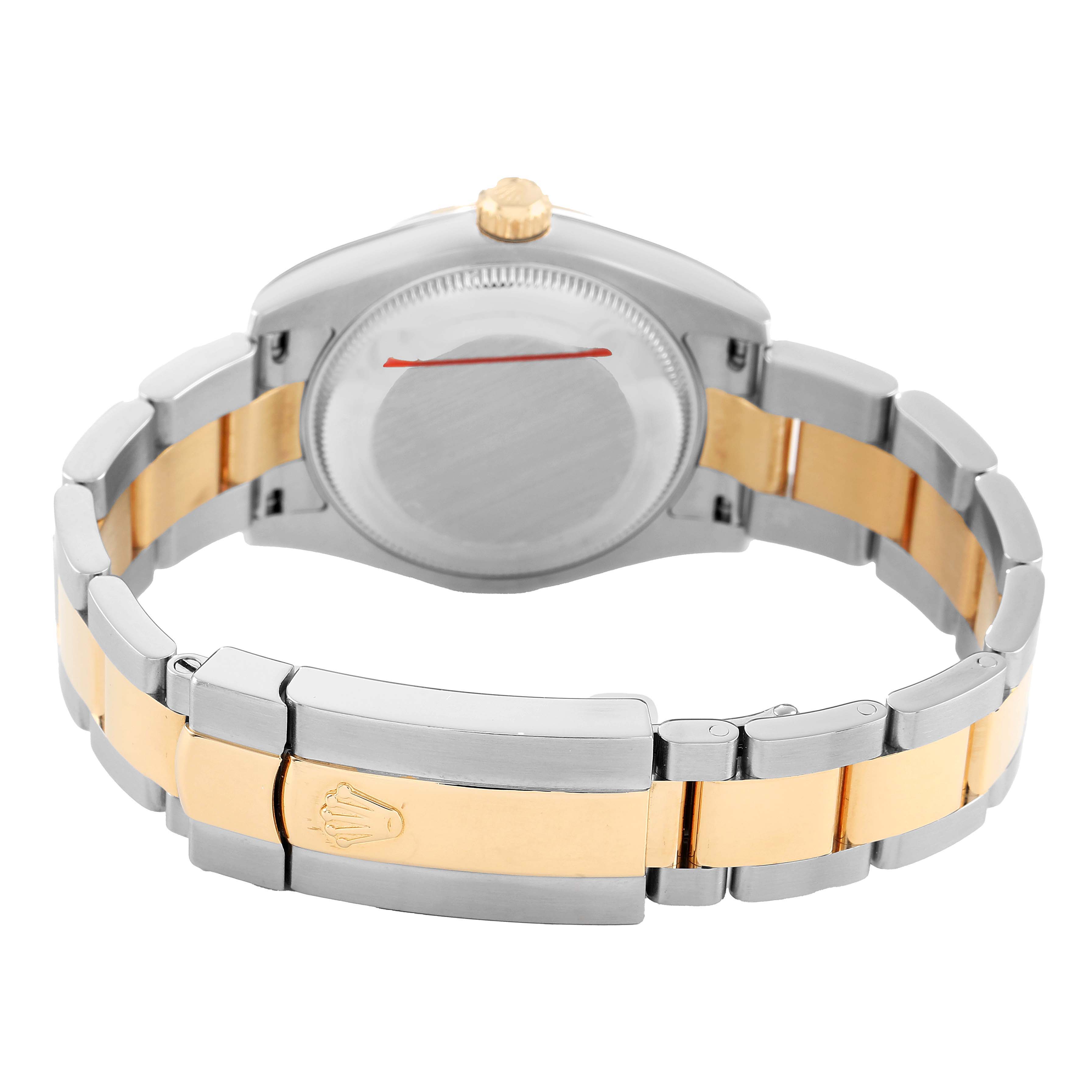 The image shows the back of the Rolex Datejust 178273 Women's Steel and Gold (two tone) Black Dial watch, highlighting the clasp and two-tone bracelet.