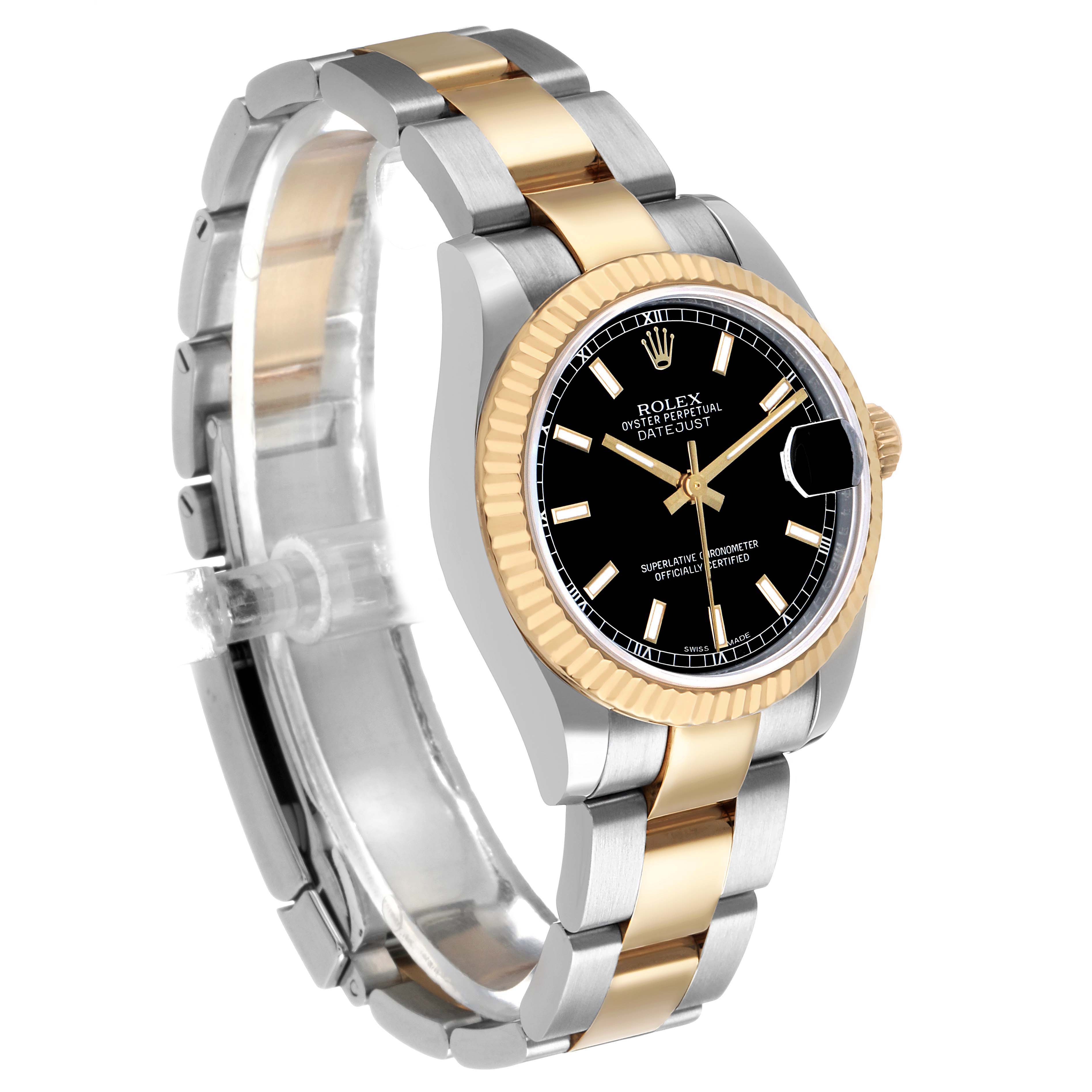The Rolex Datejust 178273 Women's Steel and Gold (two tone) Black Dial watch is shown at a three-quarter angle, highlighting its two-tone bracelet, black dial, and fluted gold bezel.