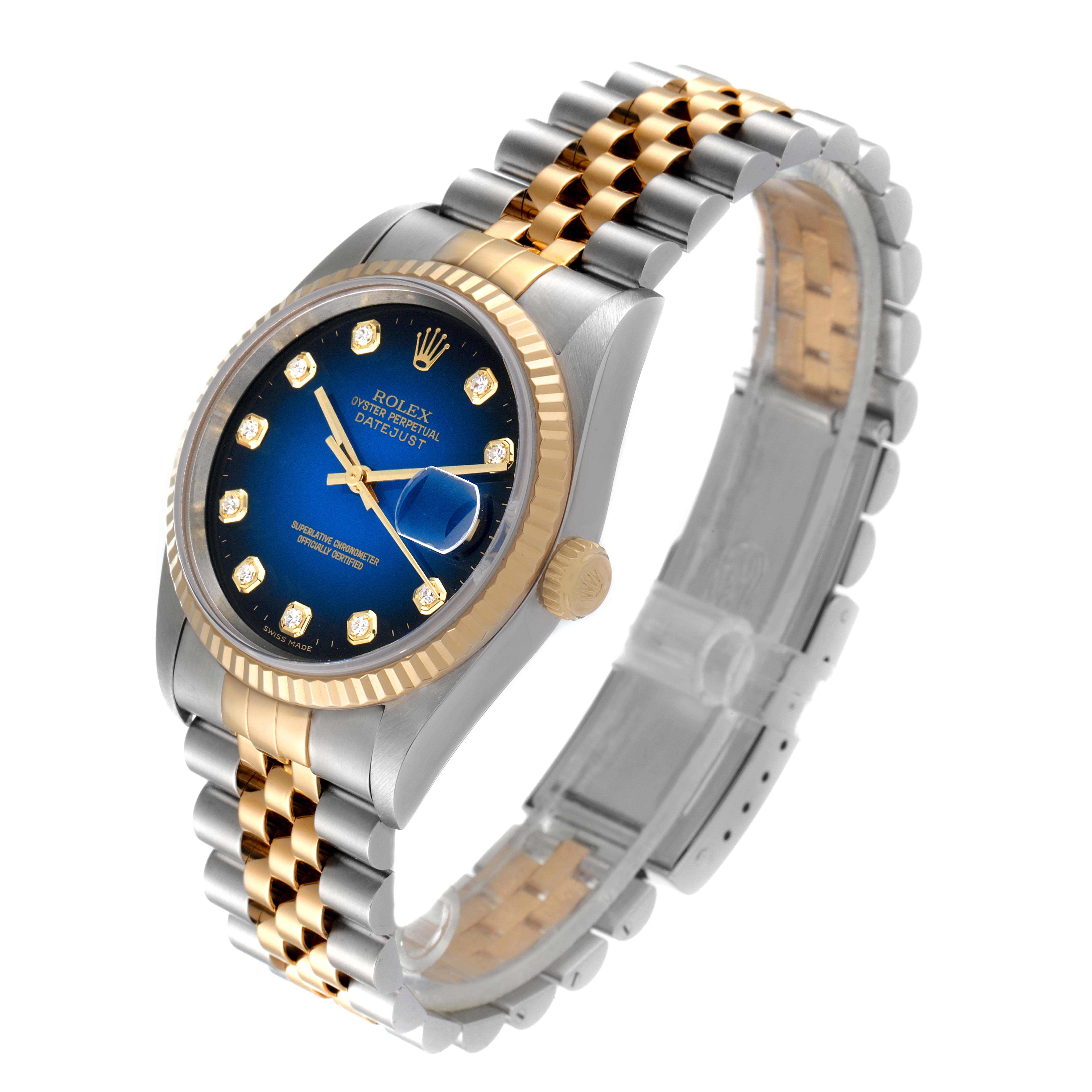 This Rolex Datejust 16233 Men's Steel and Gold (two tone) Blue Dial 16233 Men's Steel and Gold (two tone) Blue Dial watch is shown at a slight left angle, displaying its face, bezel, bracelet, and clasp.