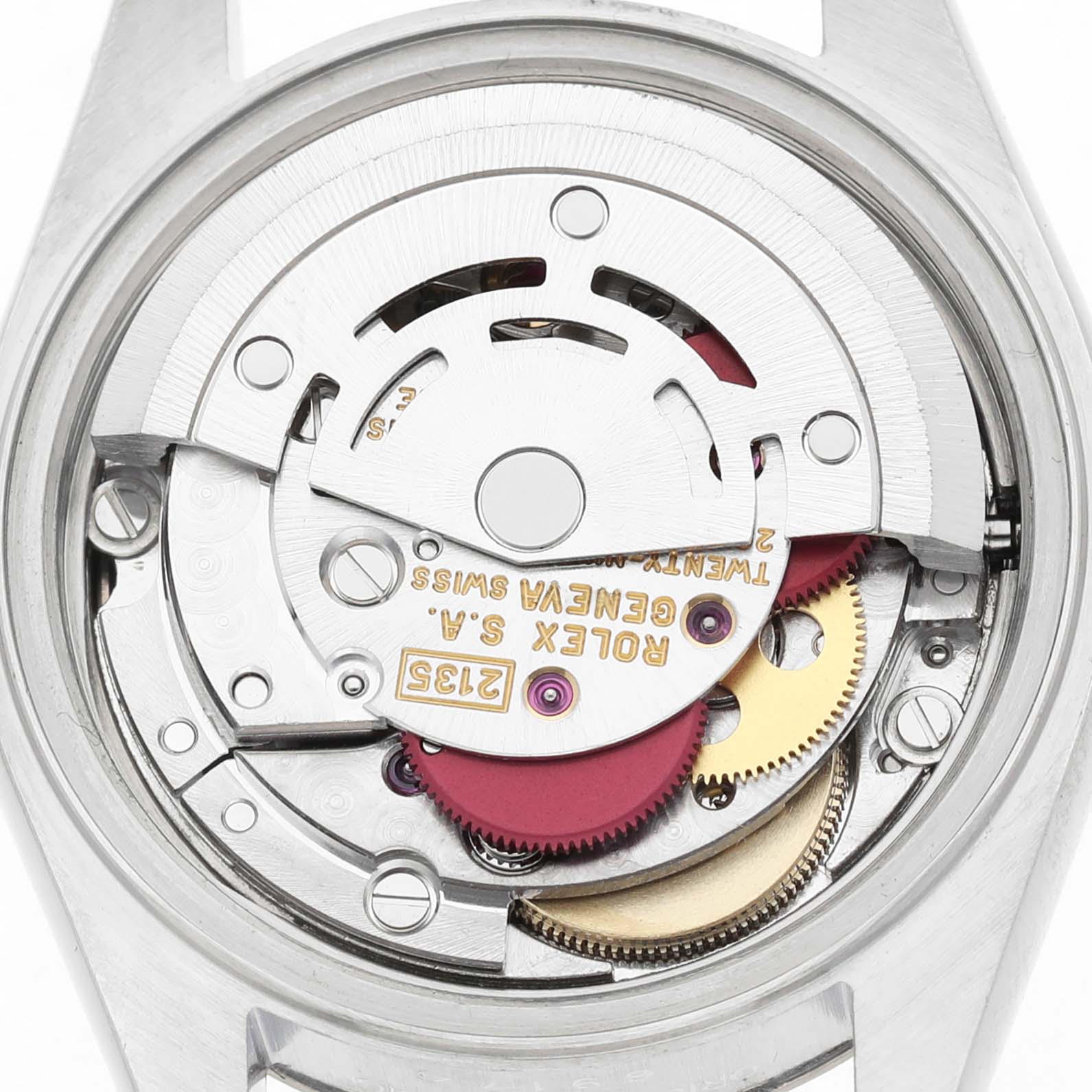 The image shows the movement of a Rolex Datejust 69174 Women's Stainless Steel Silver Dial, viewed from the back with visible gears and components.