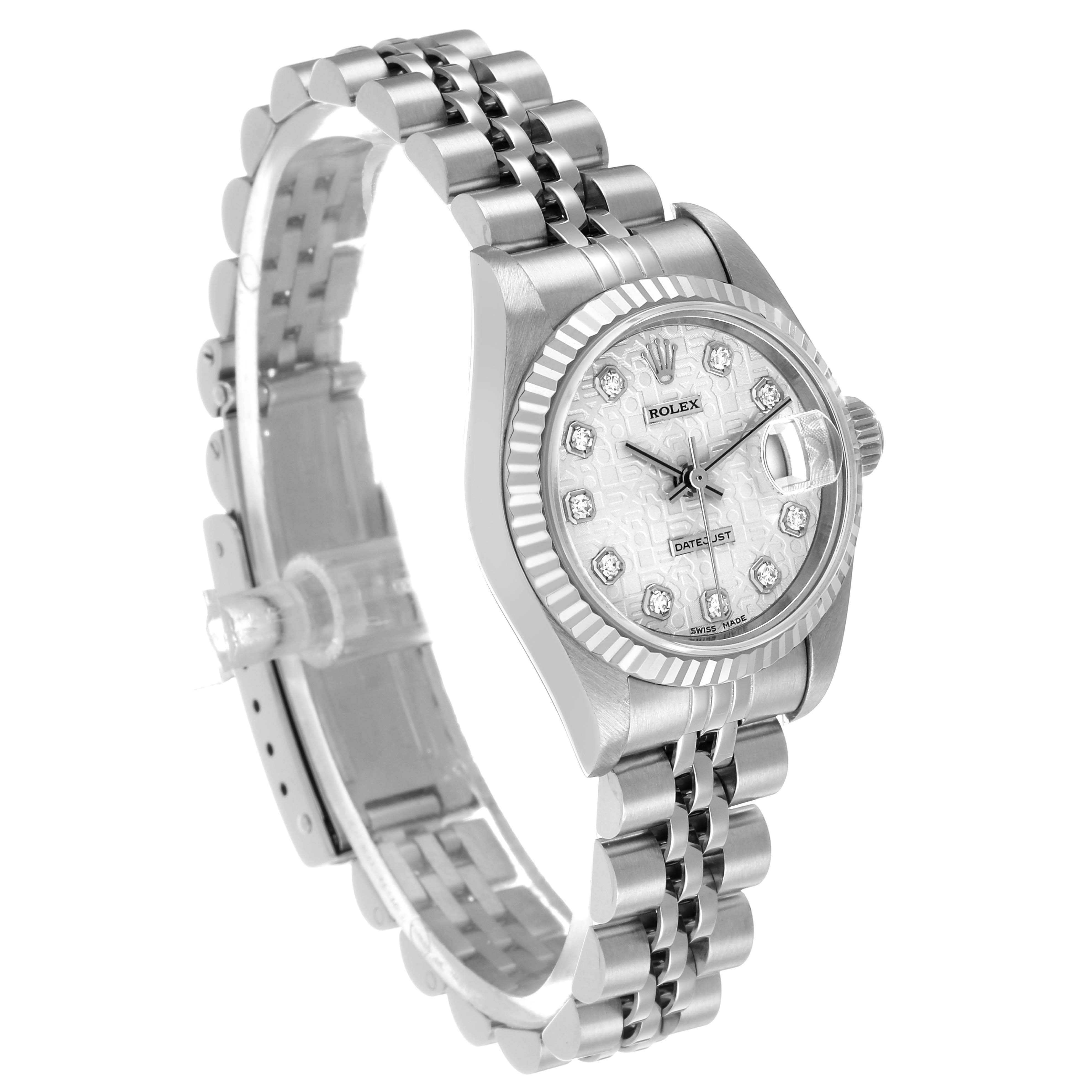 The Rolex Datejust 69174 Women's Stainless Steel Silver Dial watch is displayed at an angled view, showing its dial, fluted bezel, crown, and jubilee bracelet.