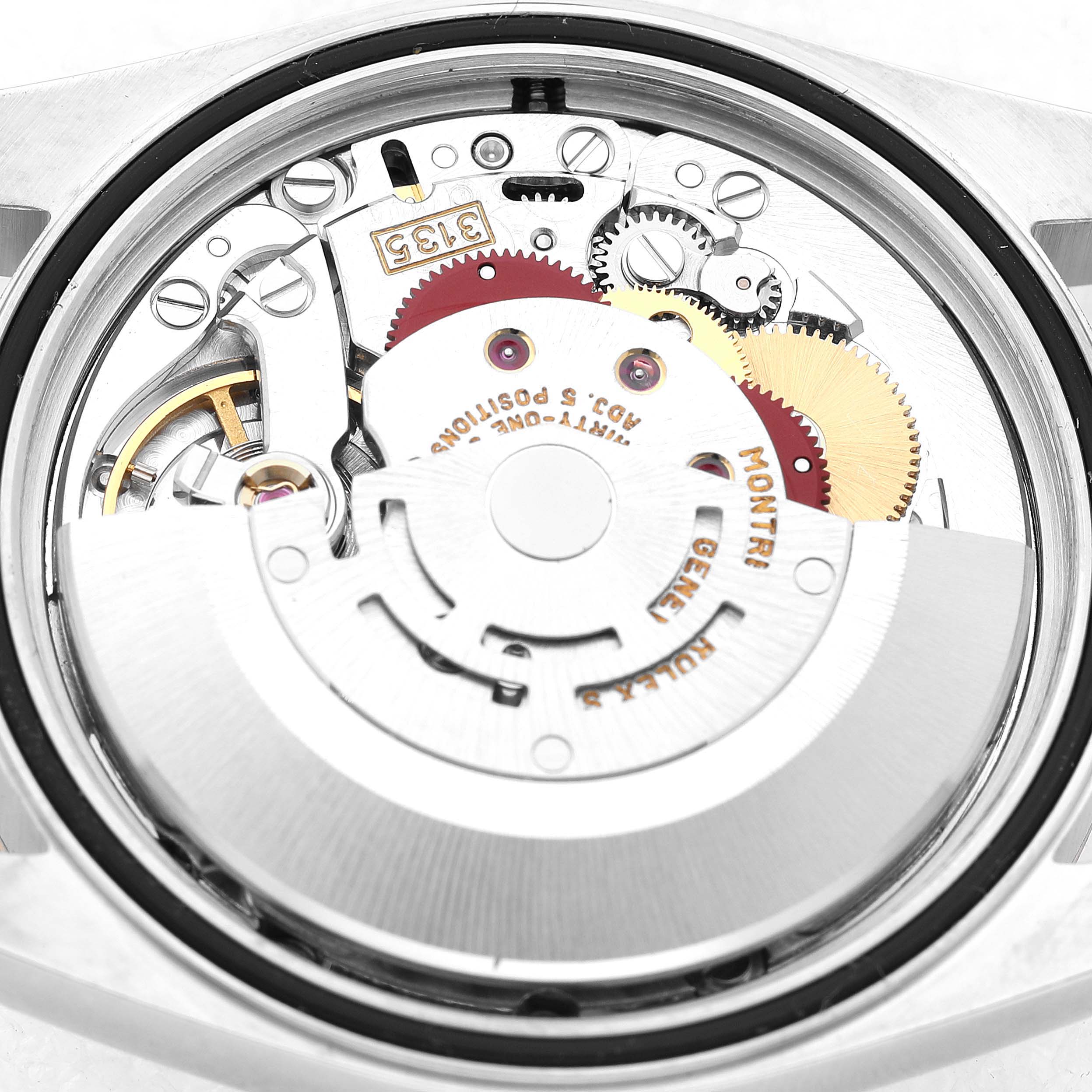 The image shows the movement and internal components of a Rolex Datejust 16233 Men's Stainless Steel Champagne Dial watch viewed from the back.