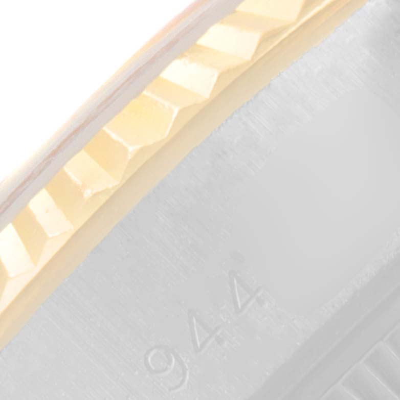 The image shows a close-up view of the bezel and case edge of a Rolex Datejust 69173 Women
s Steel and Gold (two tone) Champagne Dial 69173 Women
s Steel and Gold (two tone) Champagne Dial watch.