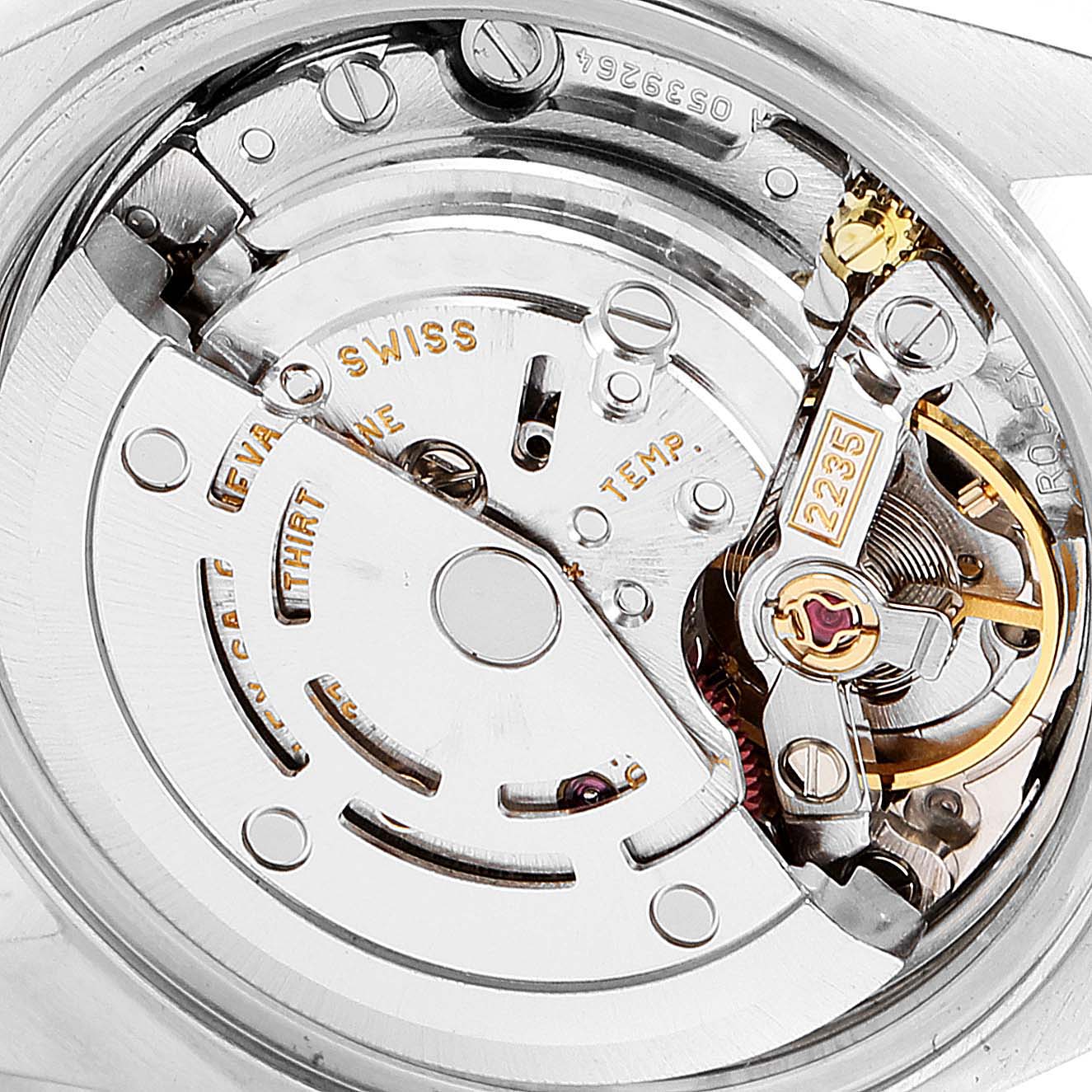 The image shows the internal mechanism of a Rolex Datejust 79173 Women's Steel and Gold (two tone) Silver Dial 79173 Women's Steel and Gold (two tone) Silver Dial watch, viewed from the back with visible gears and components.