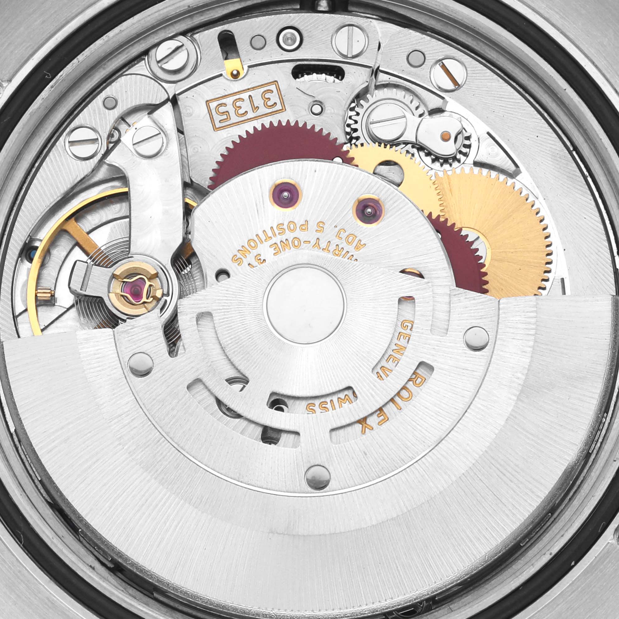 The image shows the internal mechanism of a Rolex Turn-o-Graph 116264 Men's Stainless Steel Black Dial 116264 Men's Stainless Steel Black Dial watch from a top-down angle, revealing gears and movement components.