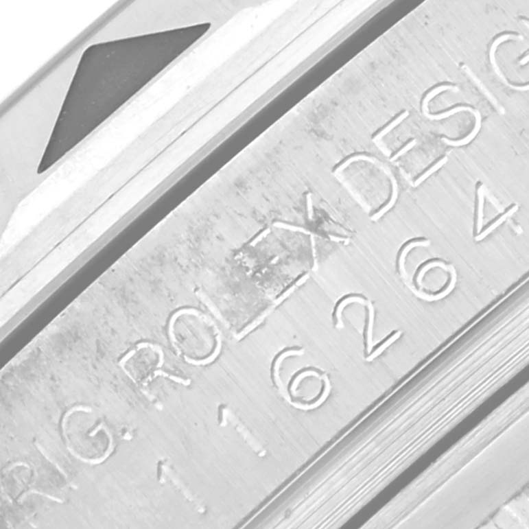 The image shows a close-up of the Rolex Turn-o-Graph 116264 Men's Stainless Steel Black Dial 116264 Men's Stainless Steel Black Dial model's engraved side with part of the bezel visible.