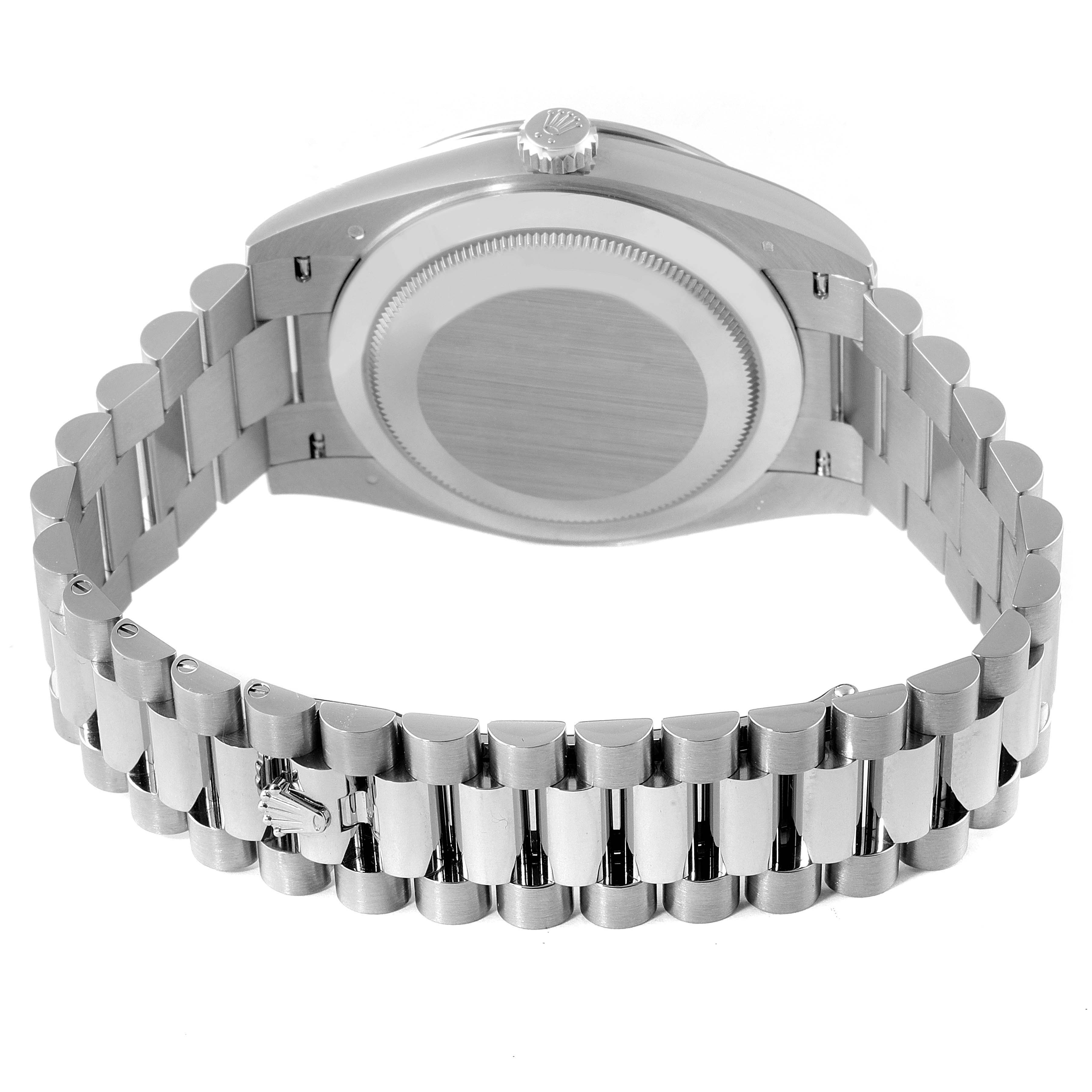 The image shows the back view of the Rolex President 228349RBR Men's White Gold Black Dial 228349RBR Men's White Gold Black Dial model watch, highlighting the case back and bracelet band.