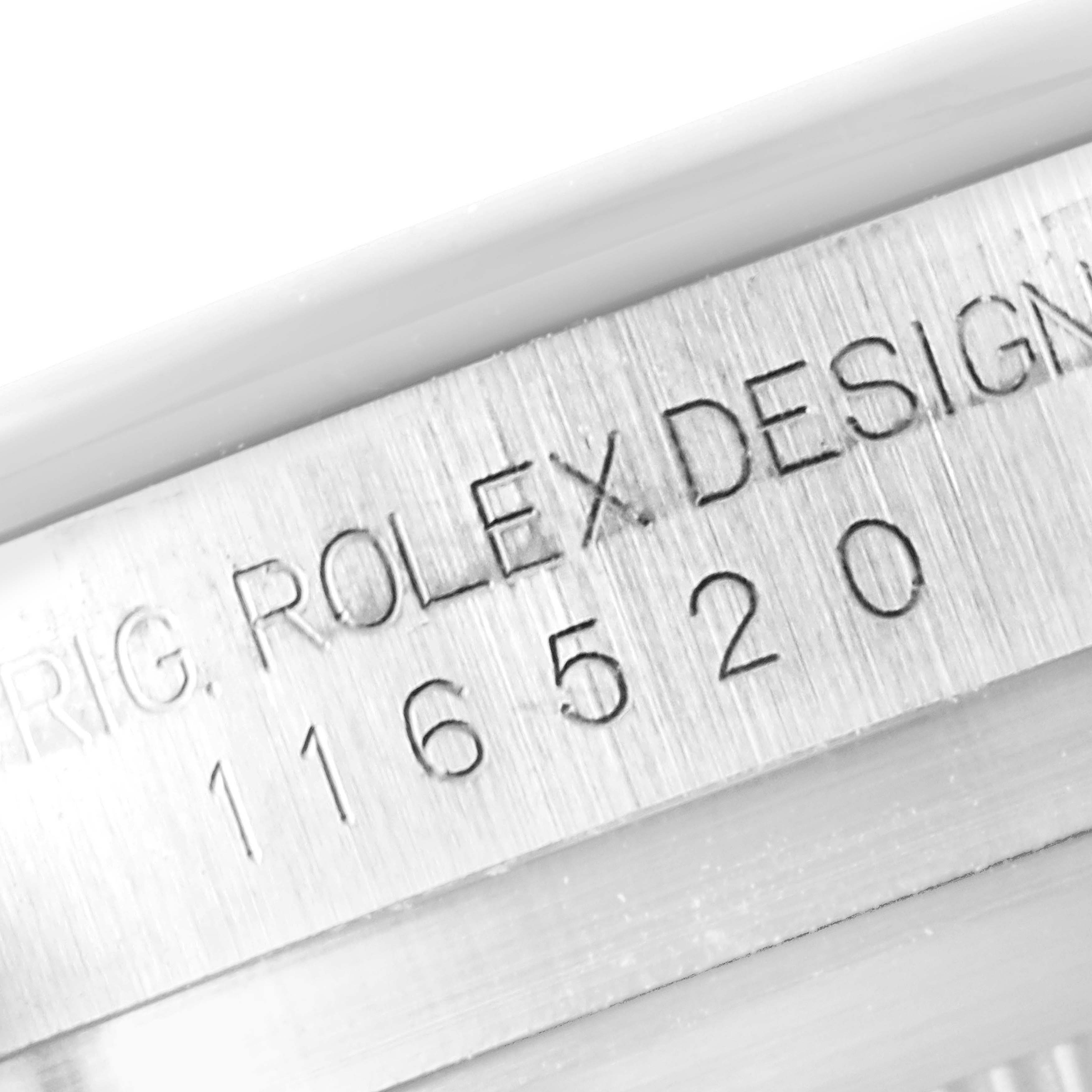 This image shows a close-up of the serial number engraved on the side of the Rolex Daytona 116520 Men's Stainless Steel Black Dial 116520 Men's Stainless Steel Black Dial watch case.
