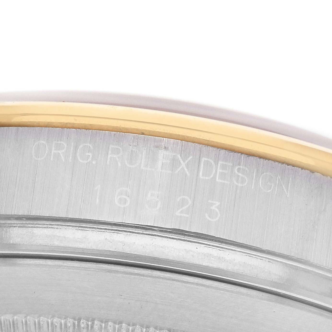 The image shows a close-up of the side of the Rolex Daytona 16523 Men's Steel and Gold (two tone) Champagne Dial watch, highlighting the model number and "Orig. Rolex Design" engraving.