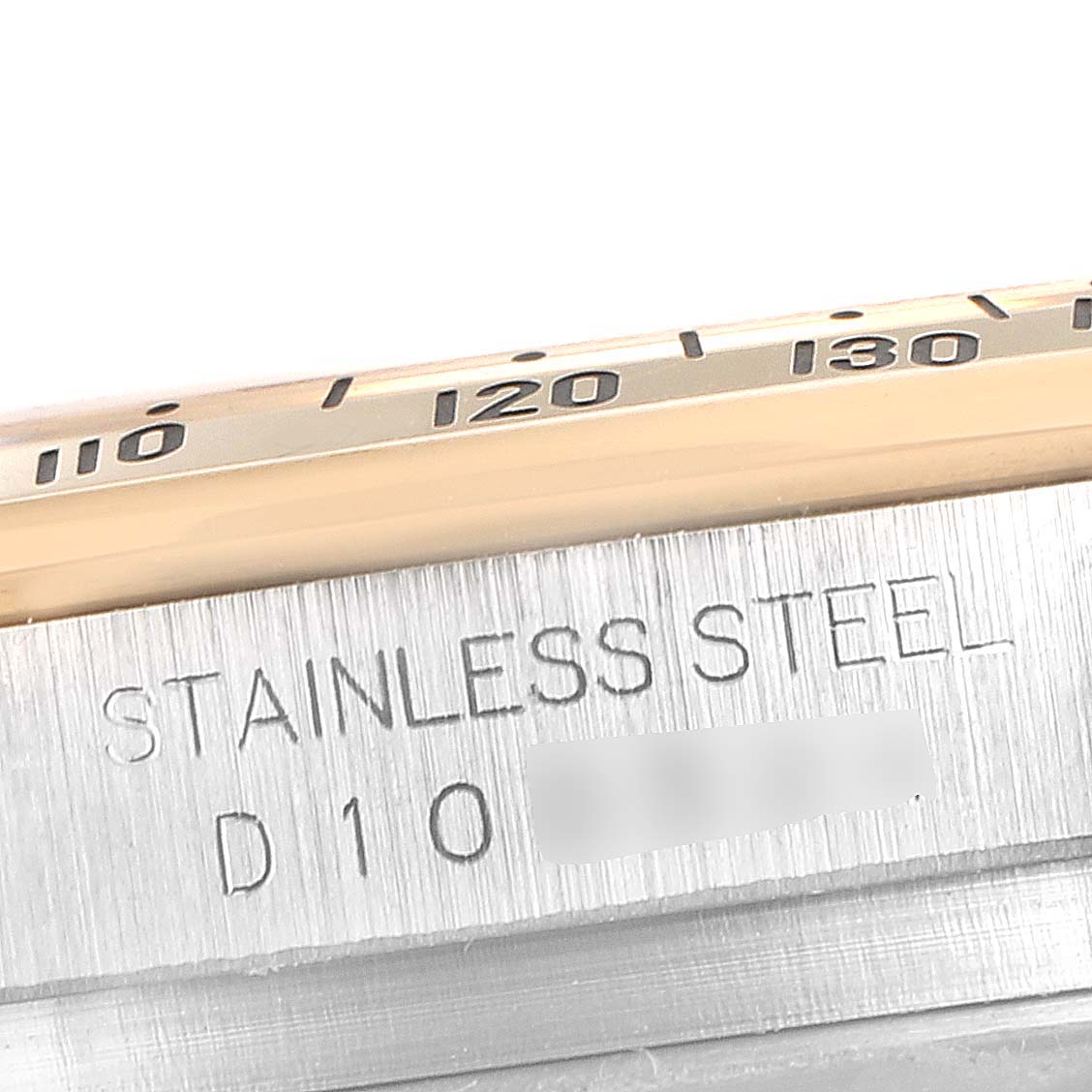 The image shows a close-up of the bezel and case side of a Rolex Daytona 116523 Men's Steel and Gold (two tone) Mother of Pearl Dial 116523 Men's Steel and Gold (two tone) Mother of Pearl Dial watch, highlighting the stainless steel material.