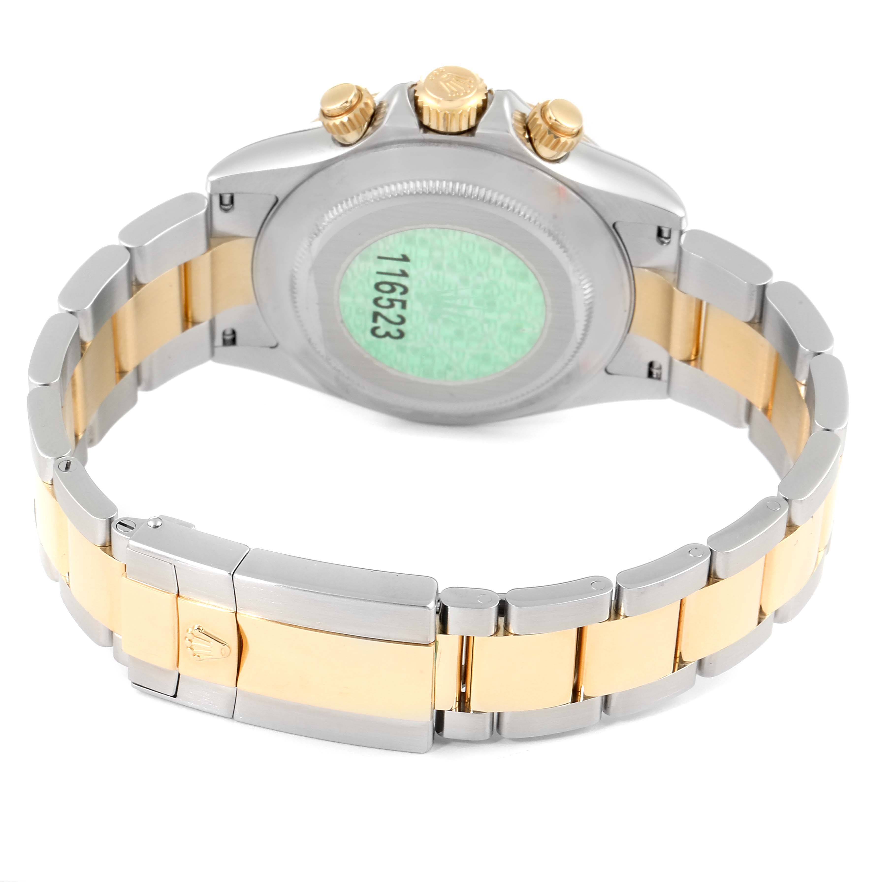 The image shows the backside and bracelet of a Rolex Daytona 116523 Men's Steel and Gold (two tone) Mother of Pearl Dial 116523 Men's Steel and Gold (two tone) Mother of Pearl Dial watch, including the clasp and serial number area.