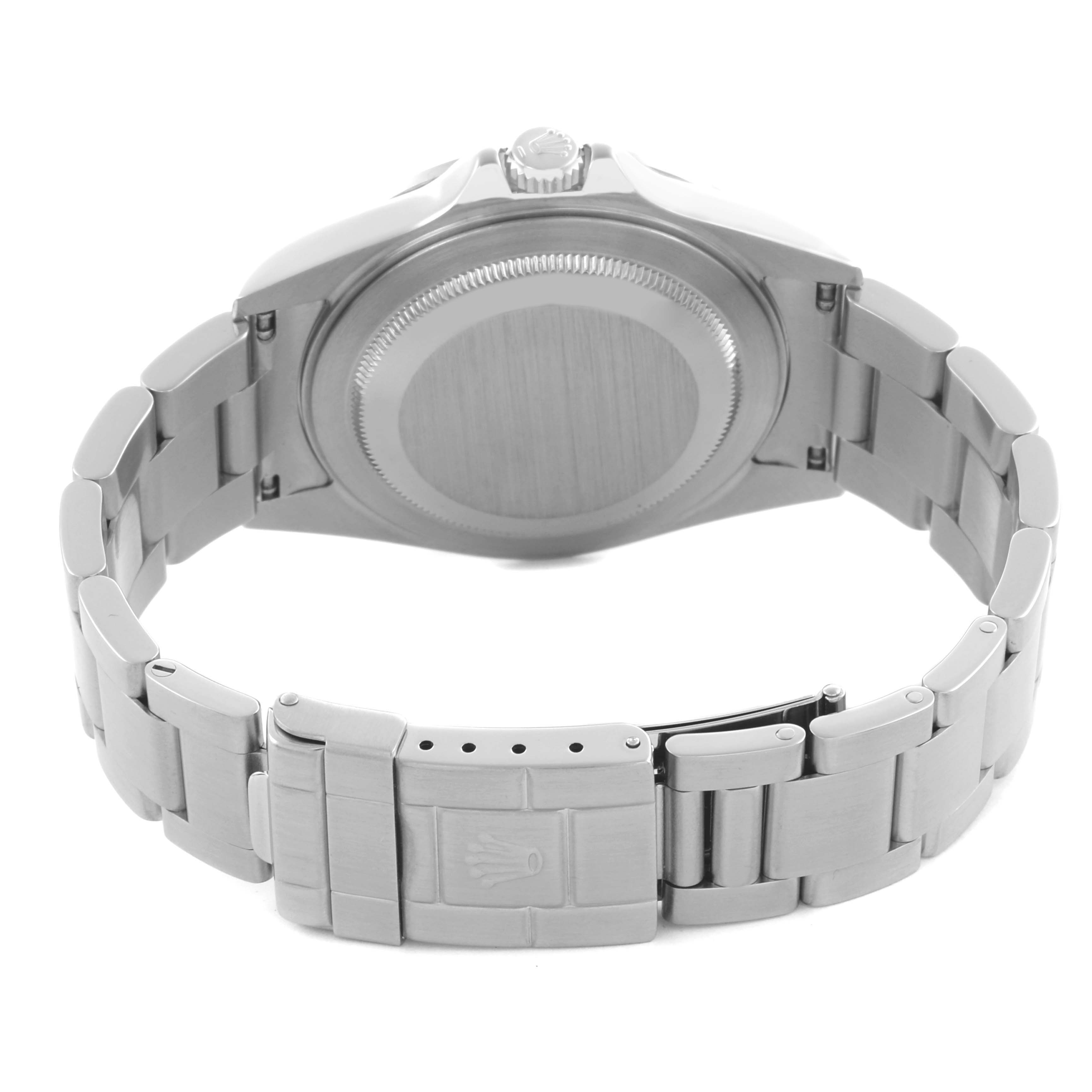 The image shows the back view of the Rolex Explorer 16570T Men's Stainless Steel Black Dial 16570T Men's Stainless Steel Black Dial watch, including the case back, crown, and metal bracelet with the clasp.