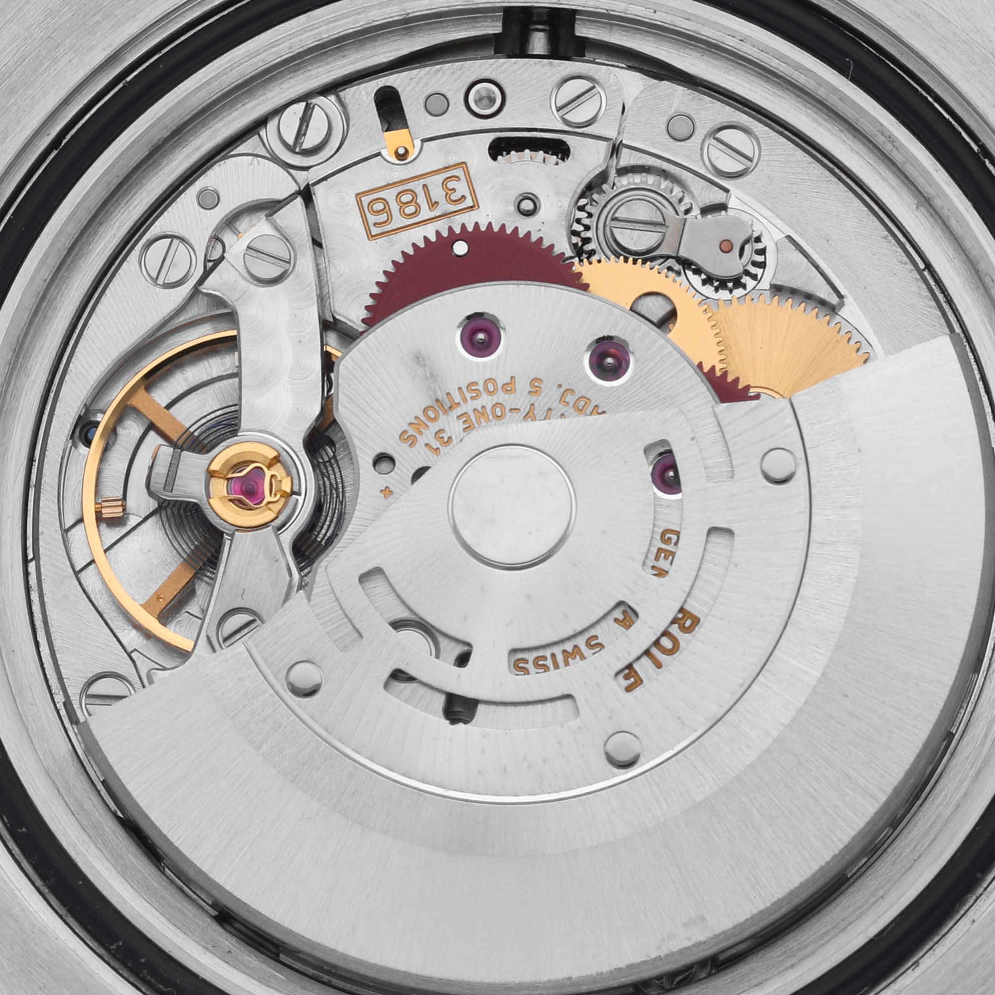 The image shows the internal mechanism of a Rolex GMT-Master 116710LN Men's Stainless Steel Black Dial 116710LN Men's Stainless Steel Black Dial, displaying gears and the rotor from a top-down view.