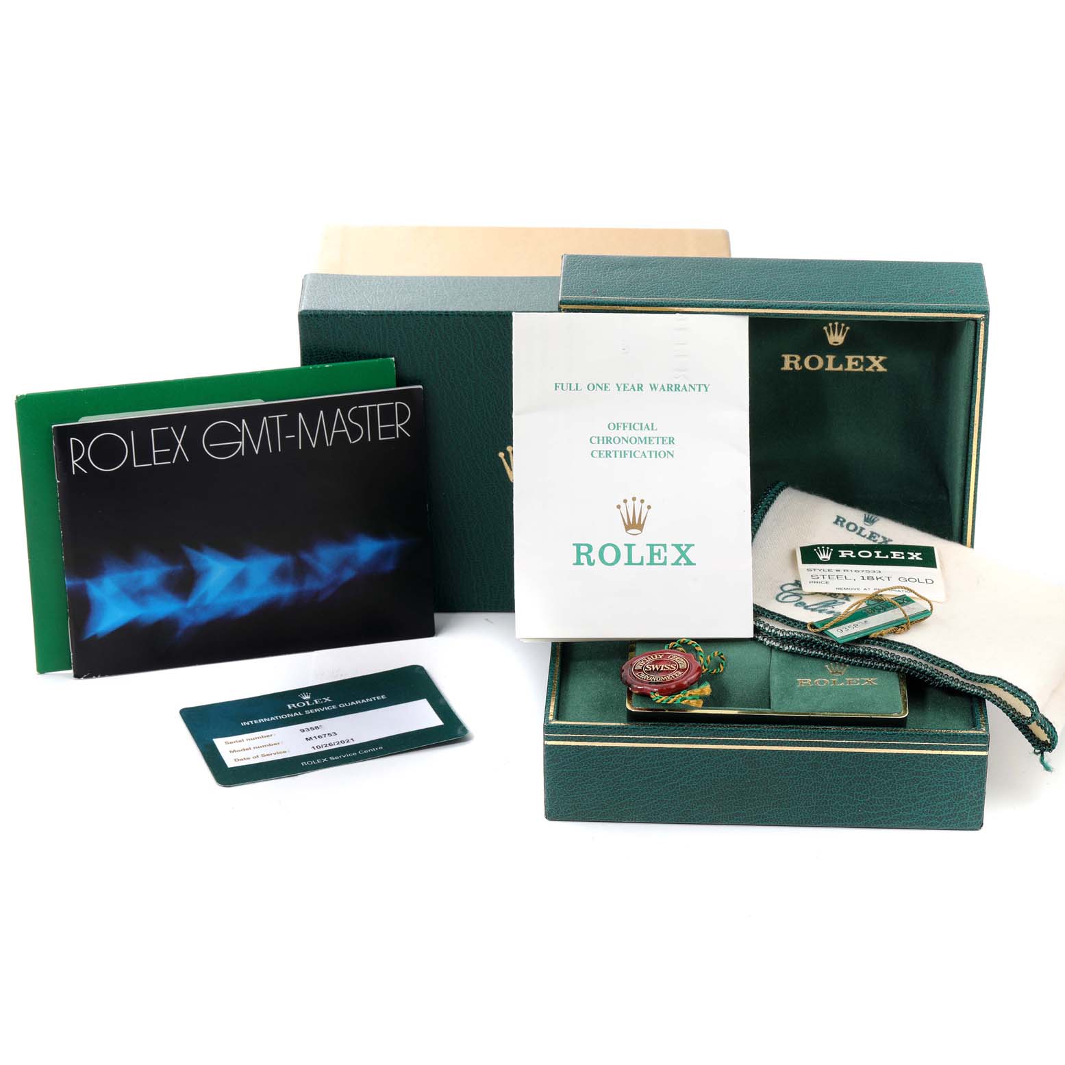 The image shows the packaging and accessories of the Rolex GMT-Master 16753 Men's Steel and Gold (two tone) Black Dial 16753 Men's Steel and Gold (two tone) Black Dial, including manuals, certification, tags, and the watch box from a front angle.