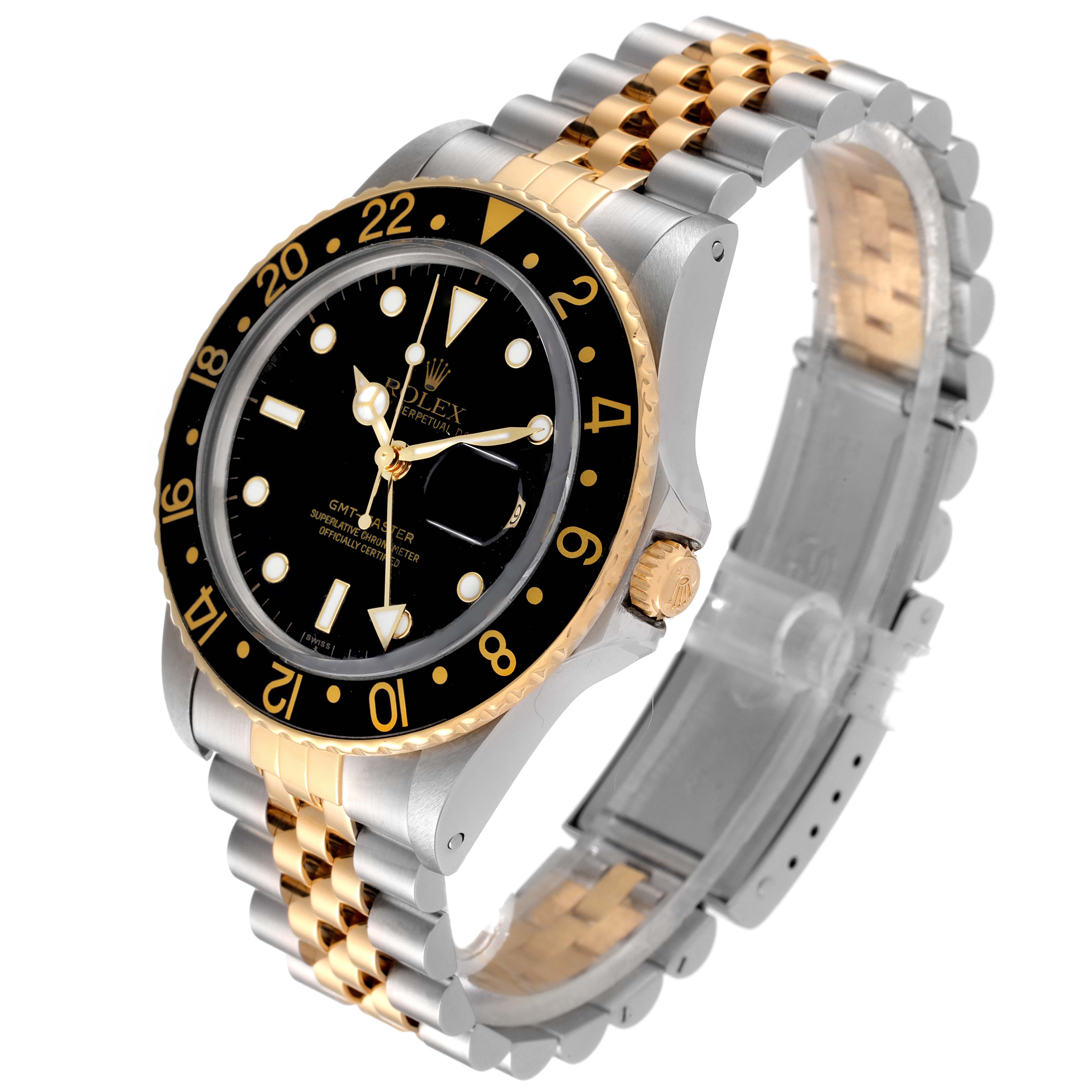 The image shows a Rolex GMT-Master 16753 Men's Steel and Gold (two tone) Black Dial 16753 Men's Steel and Gold (two tone) Black Dial watch at a slight angle, highlighting its black dial, bezel, and two-tone bracelet.
