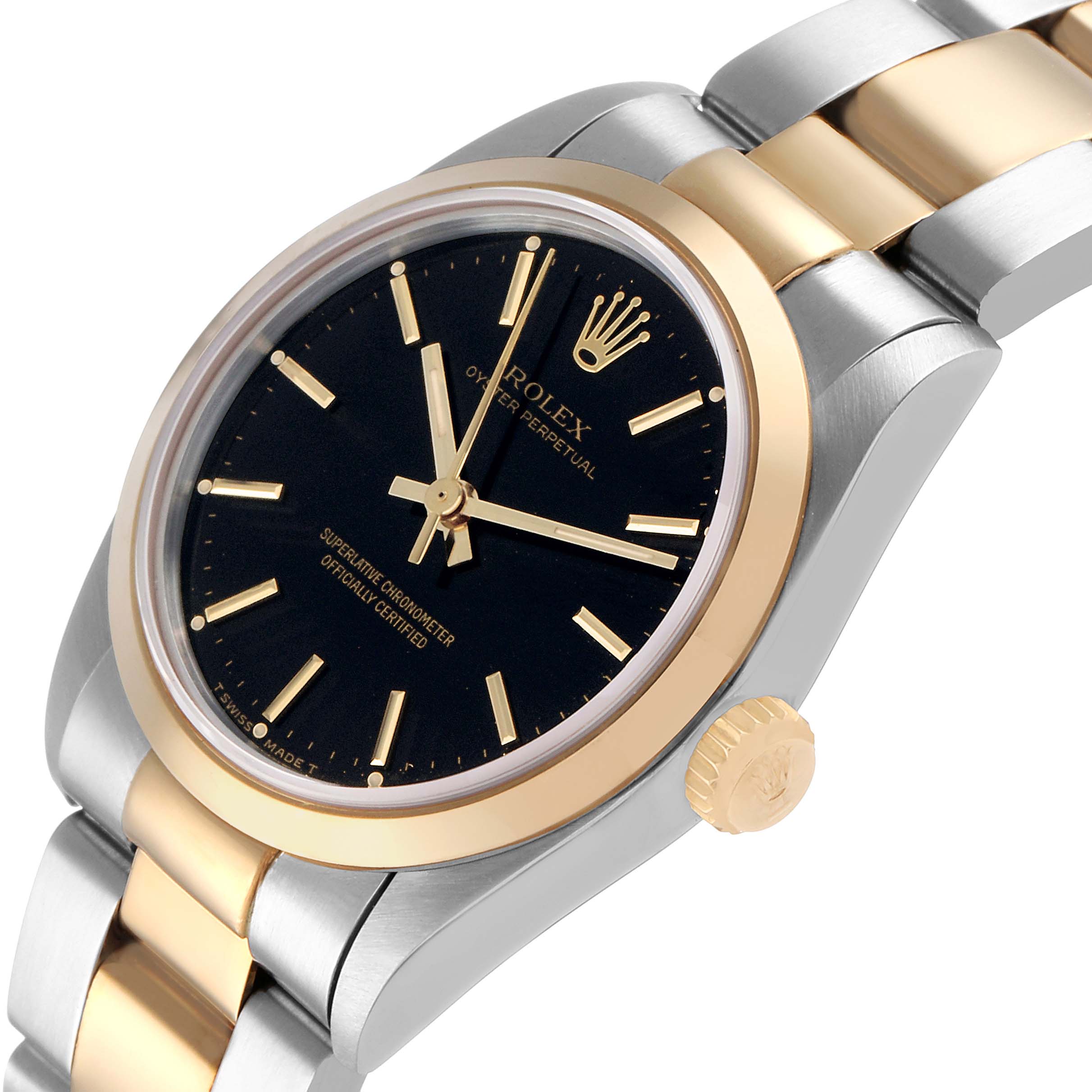 The Rolex Oyster Perpetual 67483 Women's Steel and Gold (two tone) Black Dial watch is shown at an angled view, highlighting the face, bezel, crown, and part of the bracelet.