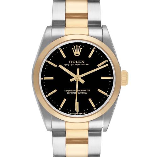 The Rolex Oyster Perpetual 67483 Women's Steel and Gold (two tone) Black Dial watch is shown from the front, displaying its black dial, gold indices, bezel, and two-tone bracelet.