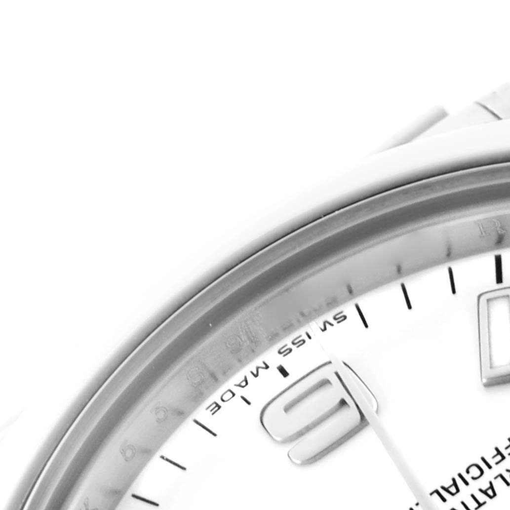 This image shows a close-up of the dial and bezel of a Rolex Mid-Size 177200 Women's Stainless Steel White Dial 177200 Women's Stainless Steel White Dial watch with the "6" and "Swiss Made" text visible.