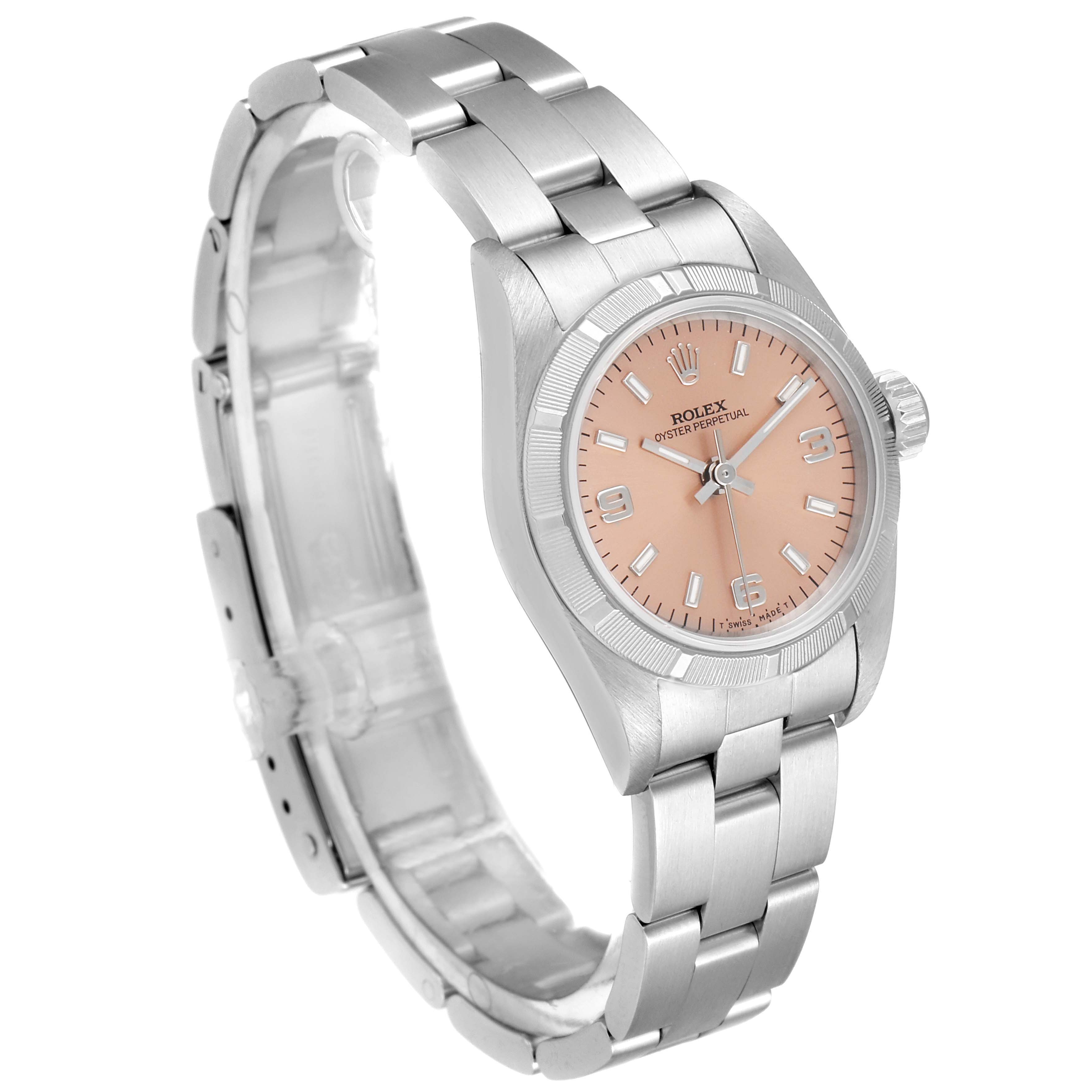 The image shows the side and front view of a Rolex Oyster Perpetual 67230 Women's Stainless Steel Pink Dial 67230 Women's Stainless Steel Pink Dial watch, highlighting the bracelet and dial.