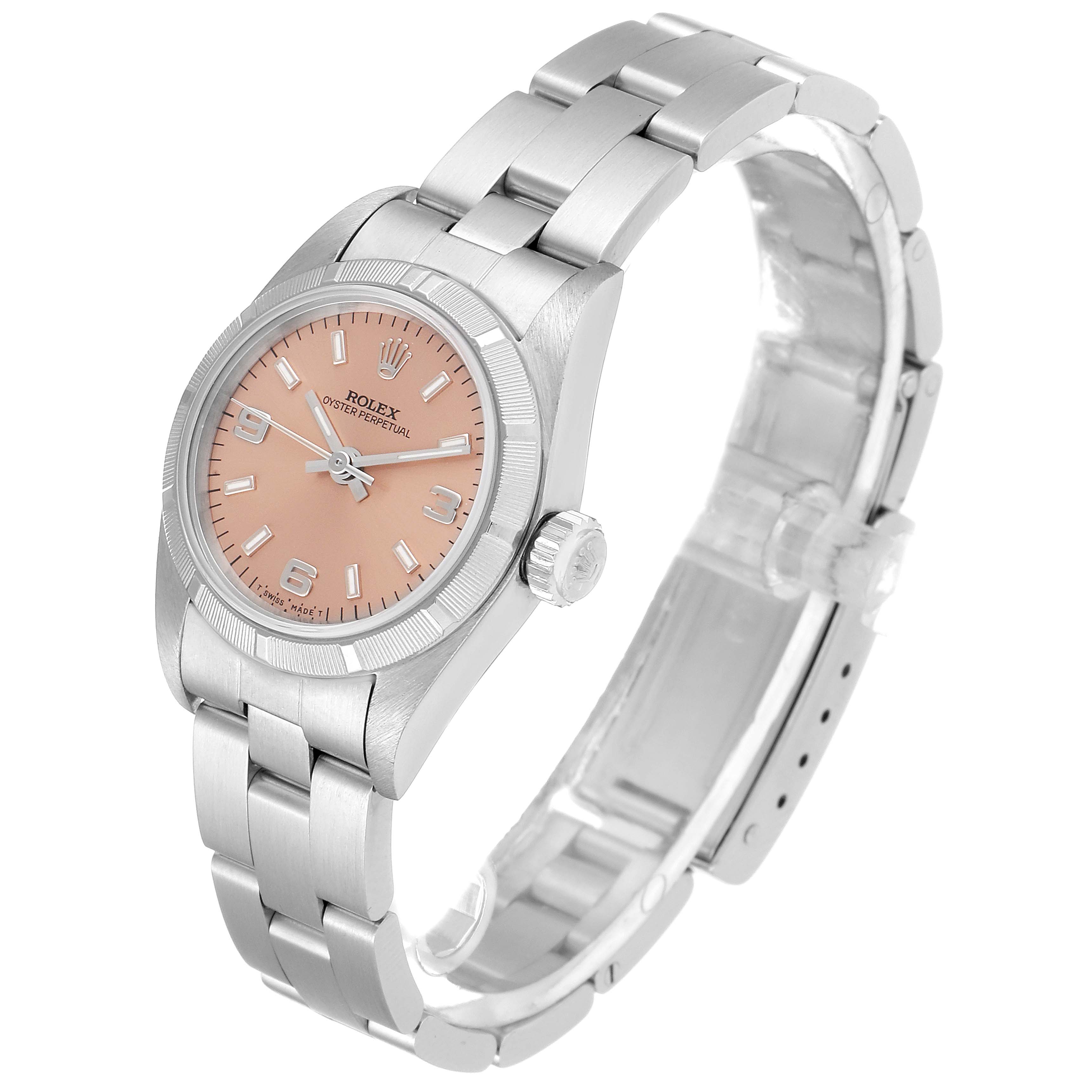 The image shows a front-angle view of a Rolex Oyster Perpetual 67230 Women's Stainless Steel Pink Dial 67230 Women's Stainless Steel Pink Dial watch, highlighting its pink dial, case, and bracelet.