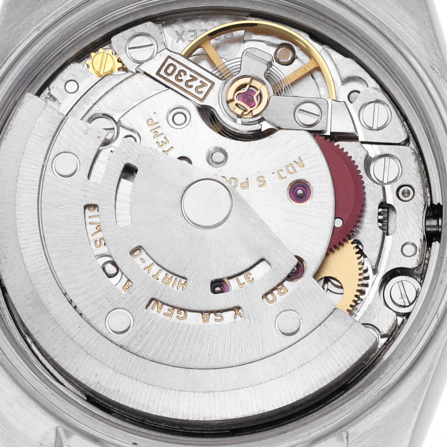 The image shows a close-up of the movement mechanism of the Rolex Oyster Perpetual 76080 Women's Stainless Steel Silver Dial 76080 Women's Stainless Steel Silver Dial watch.