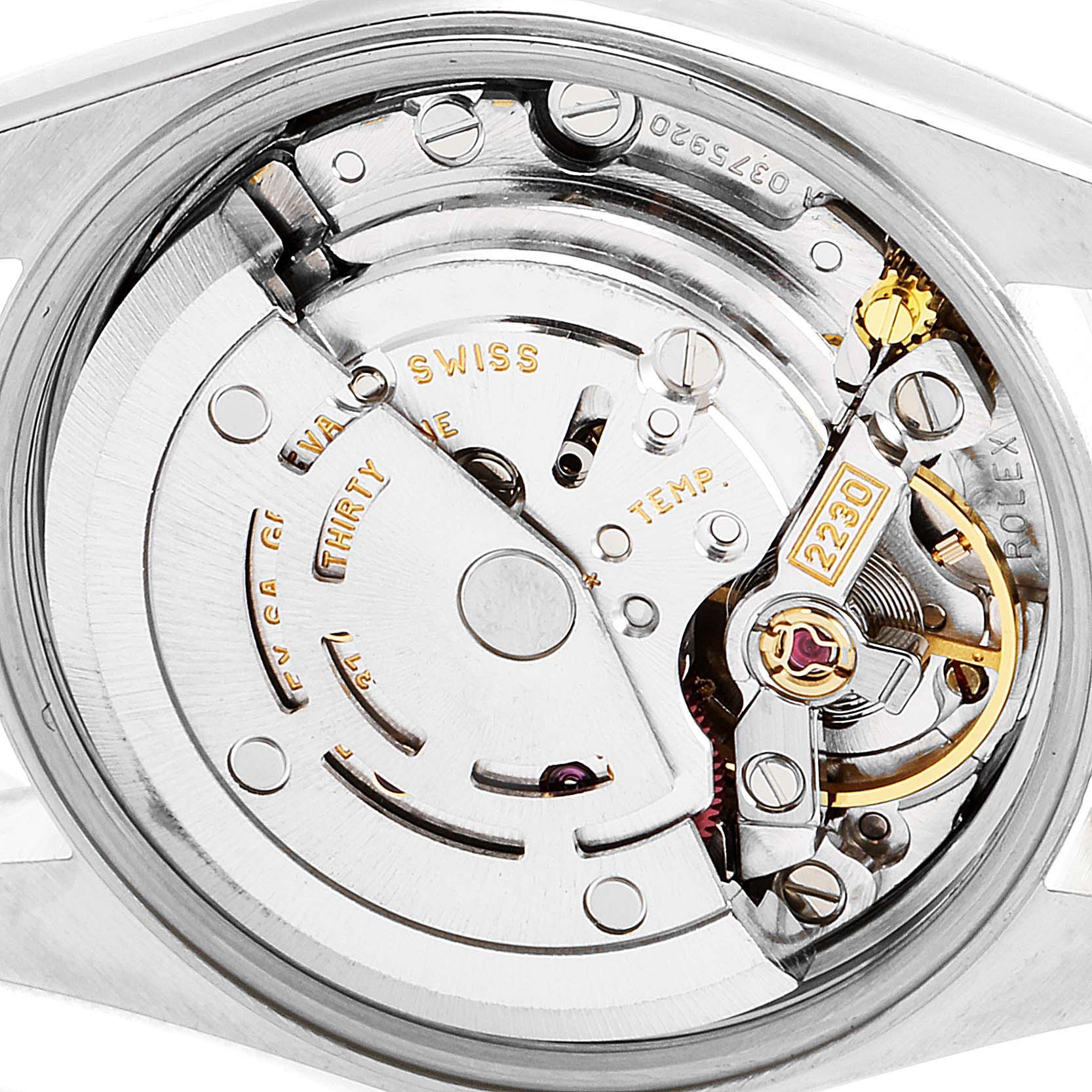 The image shows the internal mechanism of a Rolex Oyster Perpetual 76193 Women
s Steel and Gold (two tone) Champagne Dial 76193 Women
s Steel and Gold (two tone) Champagne Dial watch from a close-up, rear angle.