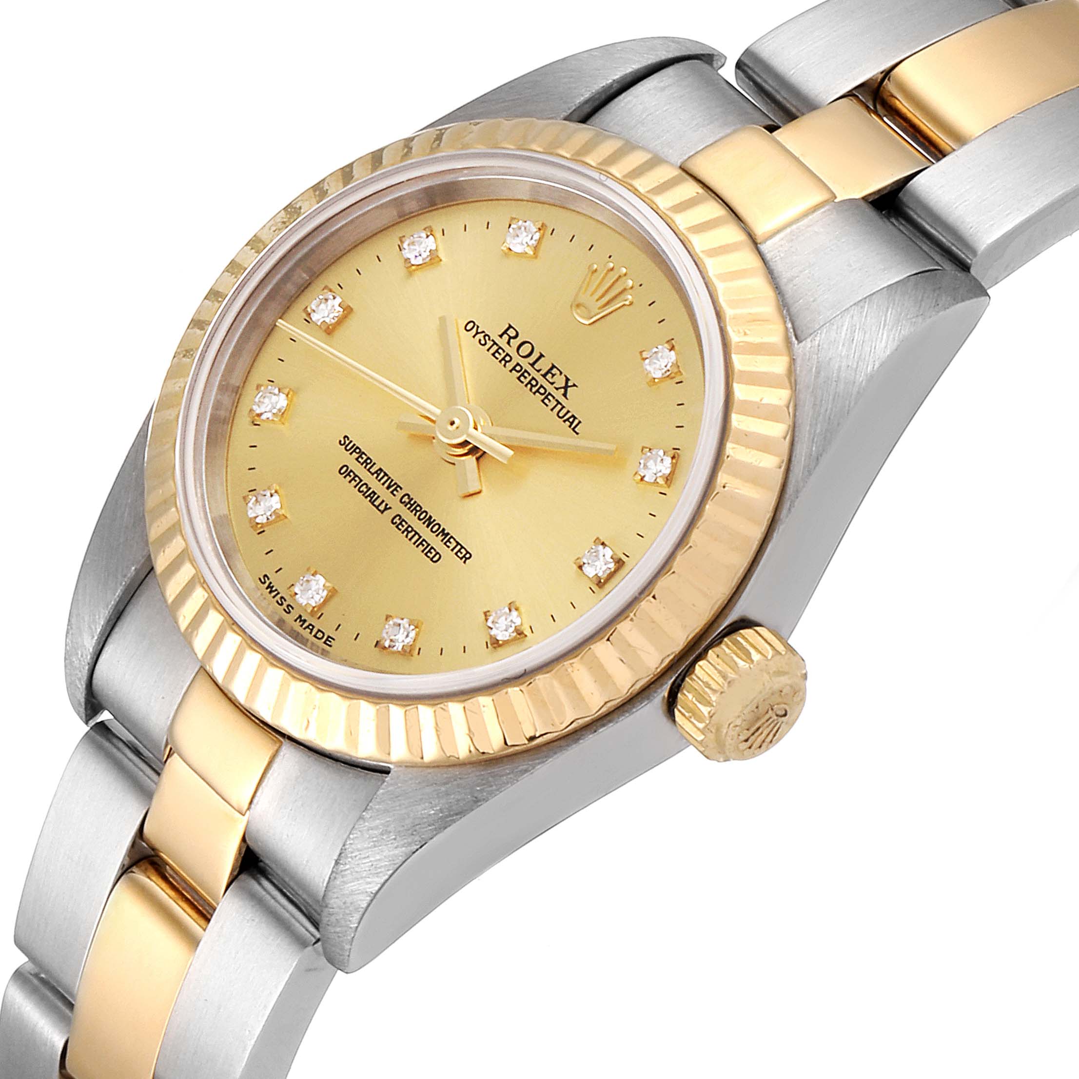 The image shows a close-up, angled view of a Rolex Oyster Perpetual 76193 Women
s Steel and Gold (two tone) Champagne Dial 76193 Women
s Steel and Gold (two tone) Champagne Dial watch featuring the dial, crown, and part of the bracelet.