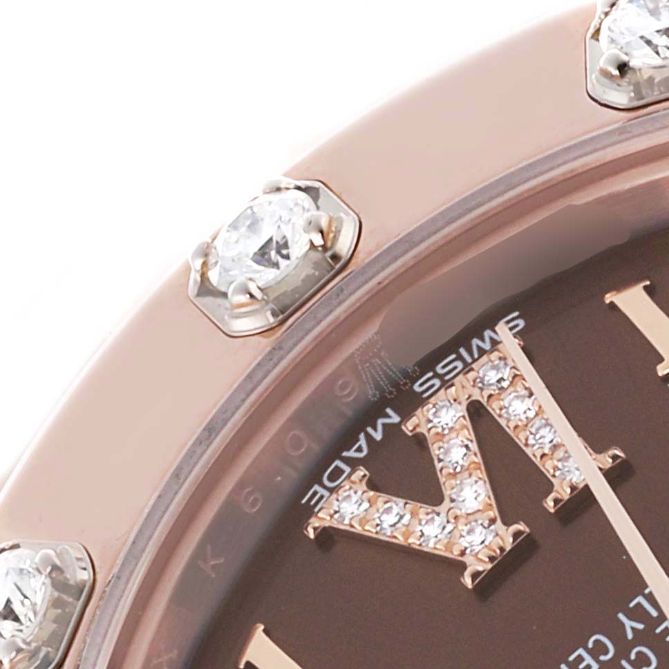 The close-up image of the Rolex Pearlmaster 81315 Women's Rose Gold Brown Dial 81315 Women's Rose Gold Brown Dial shows part of the bezel with diamonds and a portion of the dial with gem-set markers.