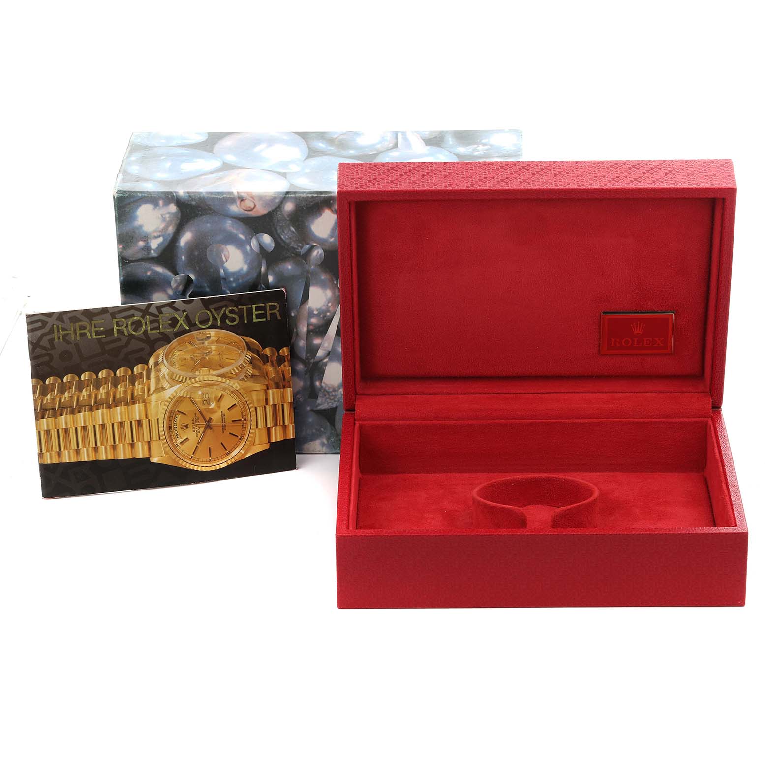 The image shows a Rolex Mid-Size watch box open, with an outer box and a booklet featuring a Rolex watch.