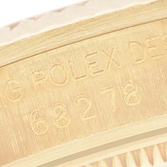 The image shows the side profile engraving of a Rolex Mid-Size watch, displaying the model number "68278."