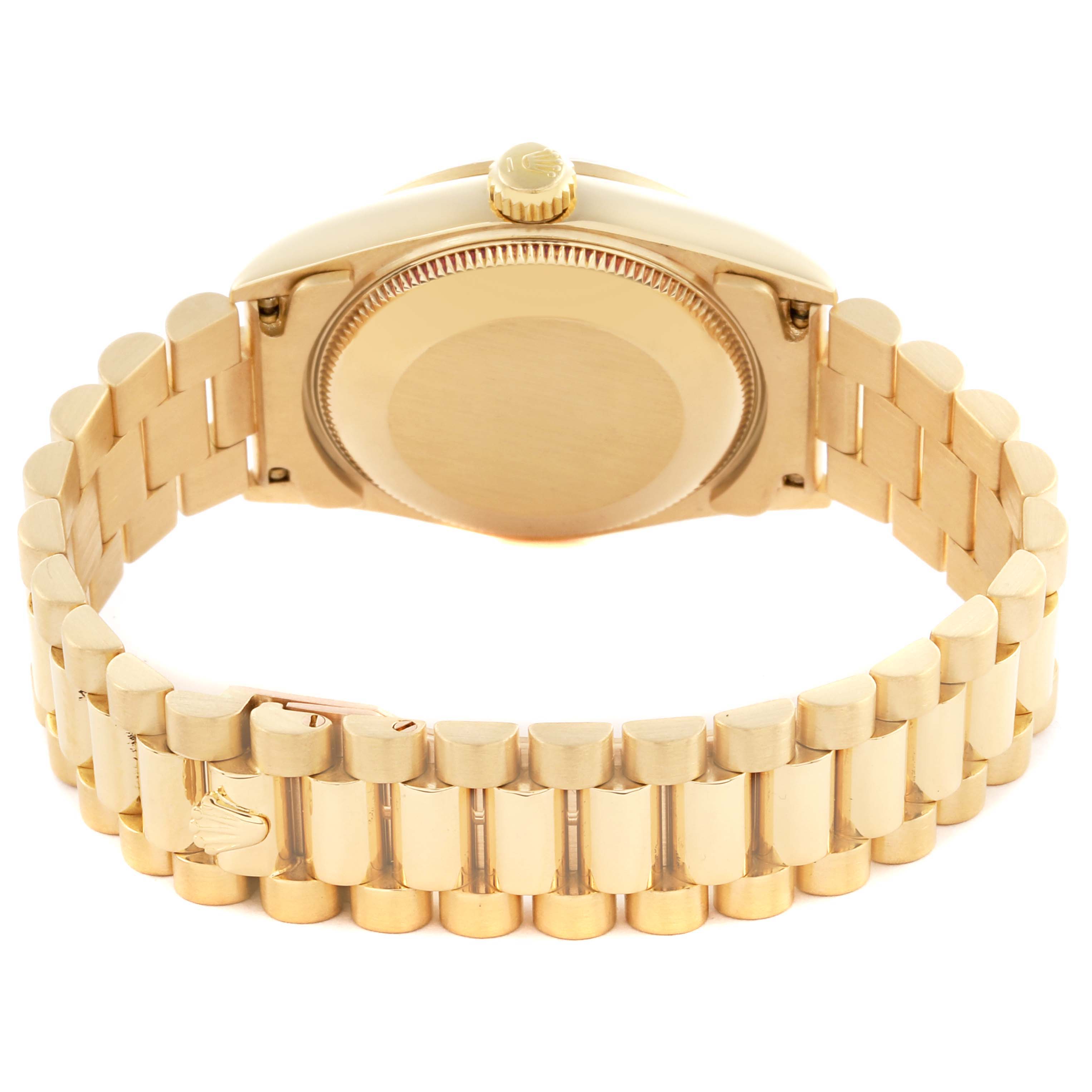 The image shows the back case and bracelet clasp of a Rolex Mid-Size model from a rear angle.