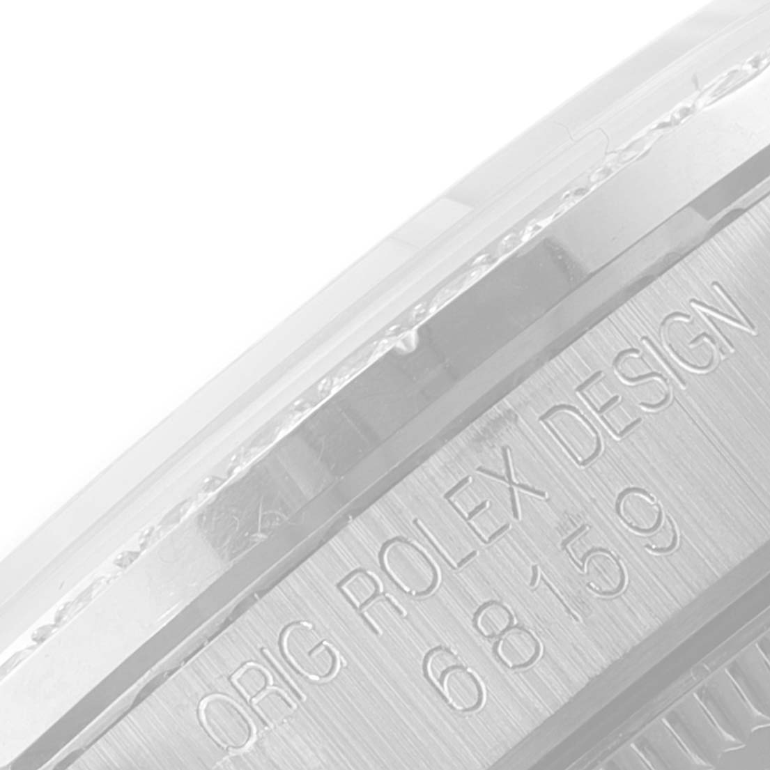 The image shows a close-up angle of the case back of a Rolex President 68159 Women's White Gold Grey Dial 68159 Women's White Gold Grey Dial model, highlighting the engraving "ORIG ROLEX DESIGN 68159."
