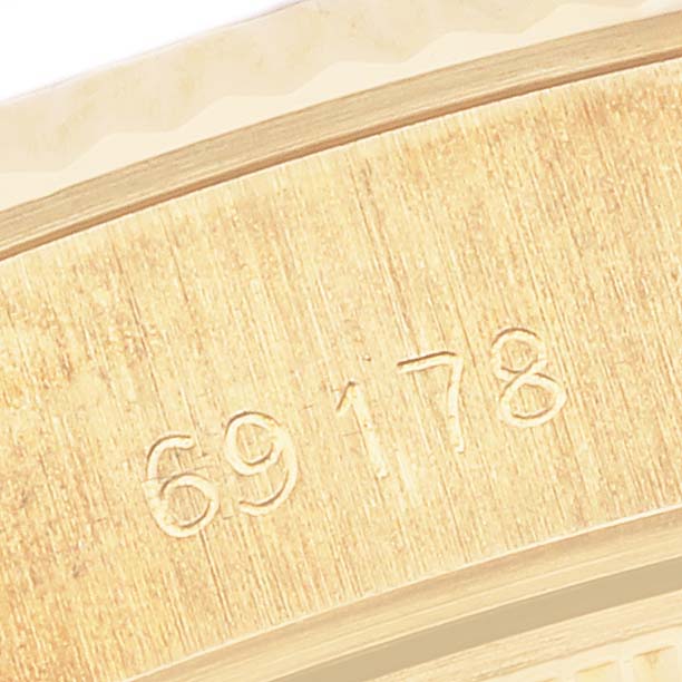 This close-up image shows the engraved model number "69178" on the inner case of a Rolex President 69178 Women's Yellow Gold Champagne Dial 69178 Women's Yellow Gold Champagne Dial watch.