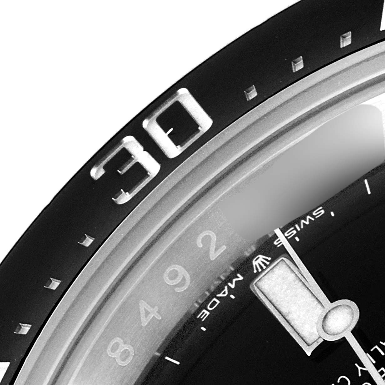 The image shows a close-up view of the bezel and partially visible dial of a Rolex Sea-Dweller 126600 Men
s Stainless Steel Black Dial 126600 Men
s Stainless Steel Black Dial watch.